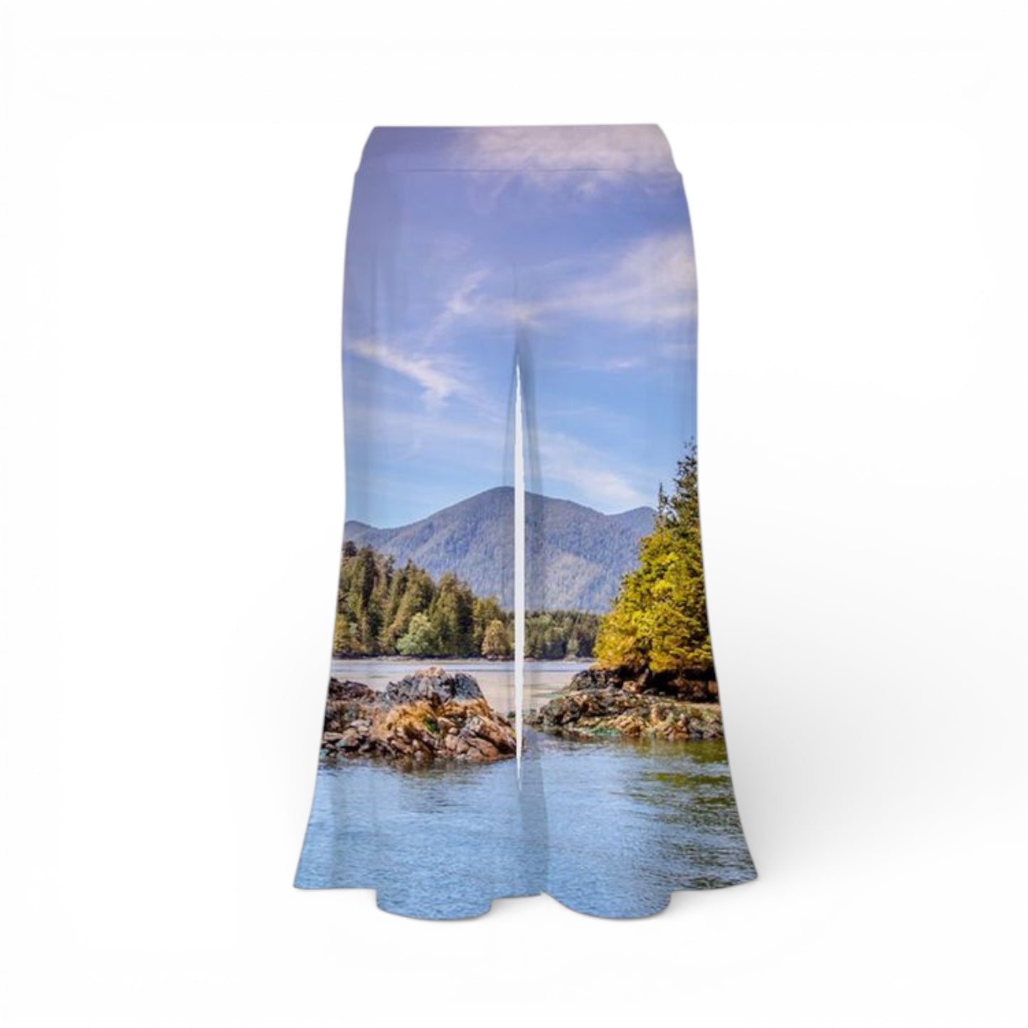 Pants with a scenic print of a lake and mountains on a white background