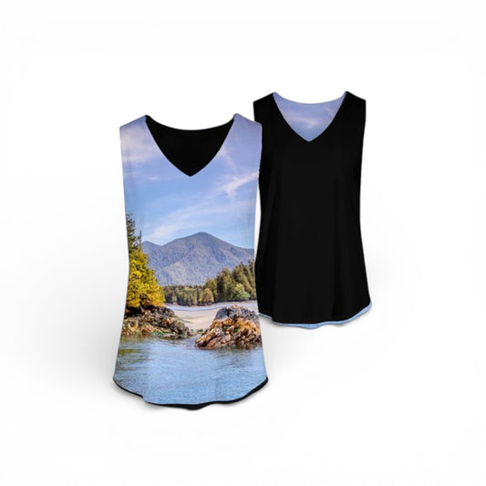 Two tank tops, one with a scenic print of a river and mountains, the other black.