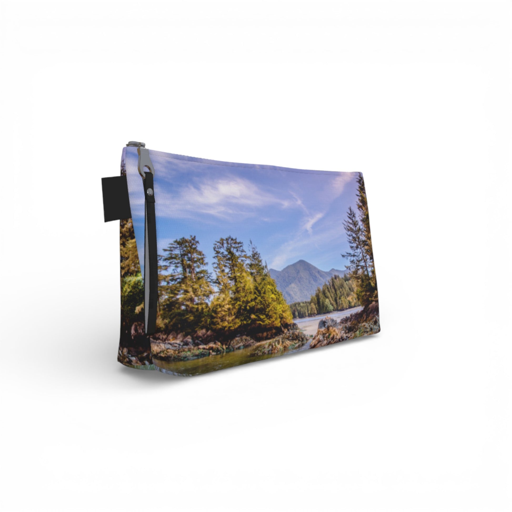Pouch with a scenic design of a road and trees on a white background