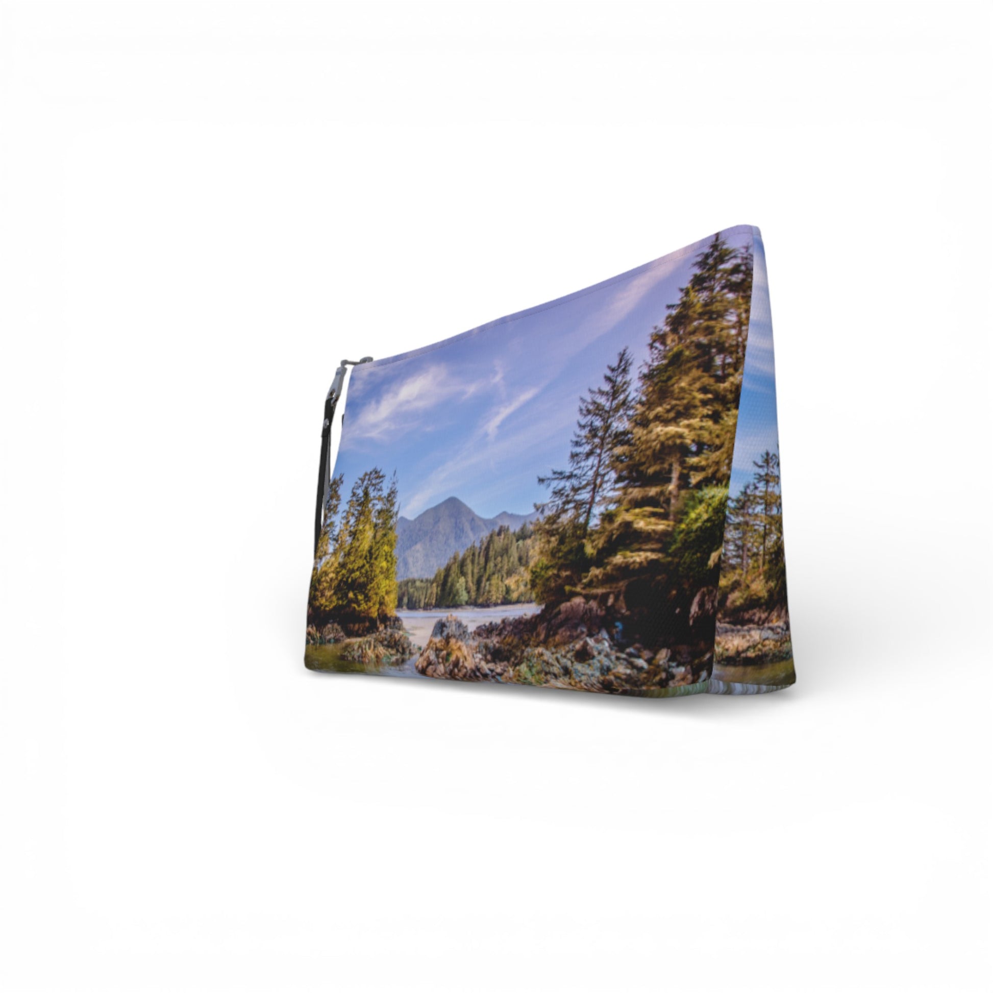 Pouch with a nature design featuring trees and mountains on a white background