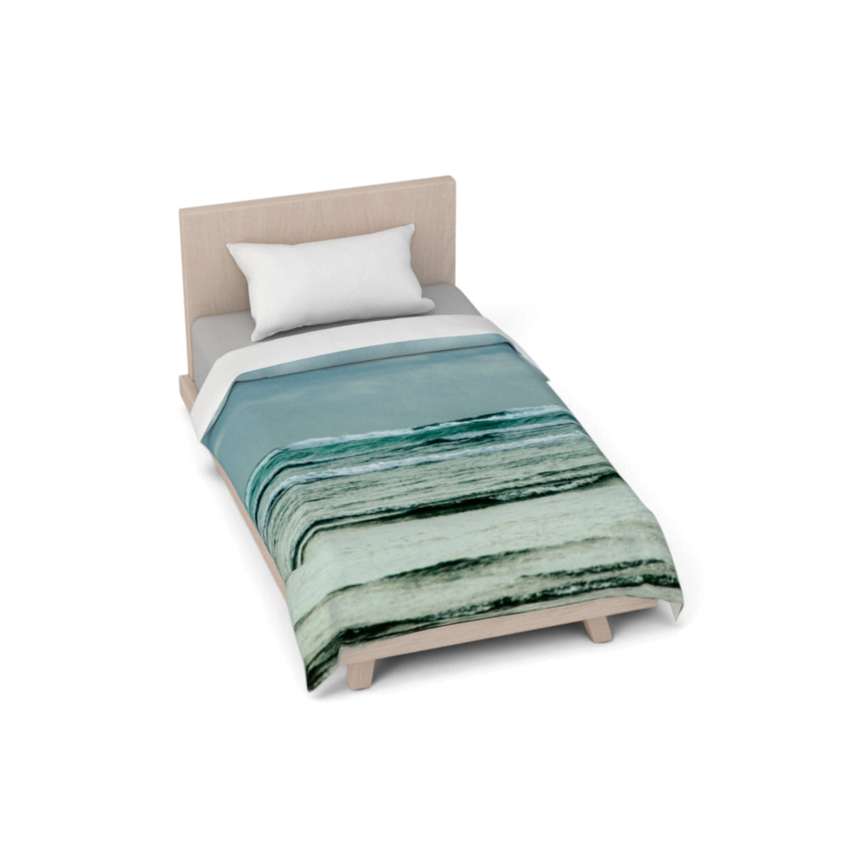 A single bed with a light wood frame and upholstered headboard, styled with a white pillow and a duvet cover featuring an abstract ocean wave pattern in shades of teal, green, and white. The bed is shown from an elevated angle against a solid white background.