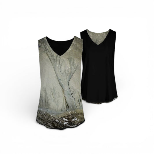 Two tank tops, one with a nature print and one black, on a white background