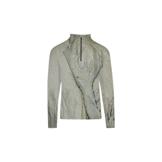 All over print men's active half zip long sleeve top.  Image is of sand with a forest scene created when a ocean wave pulls back slowly.