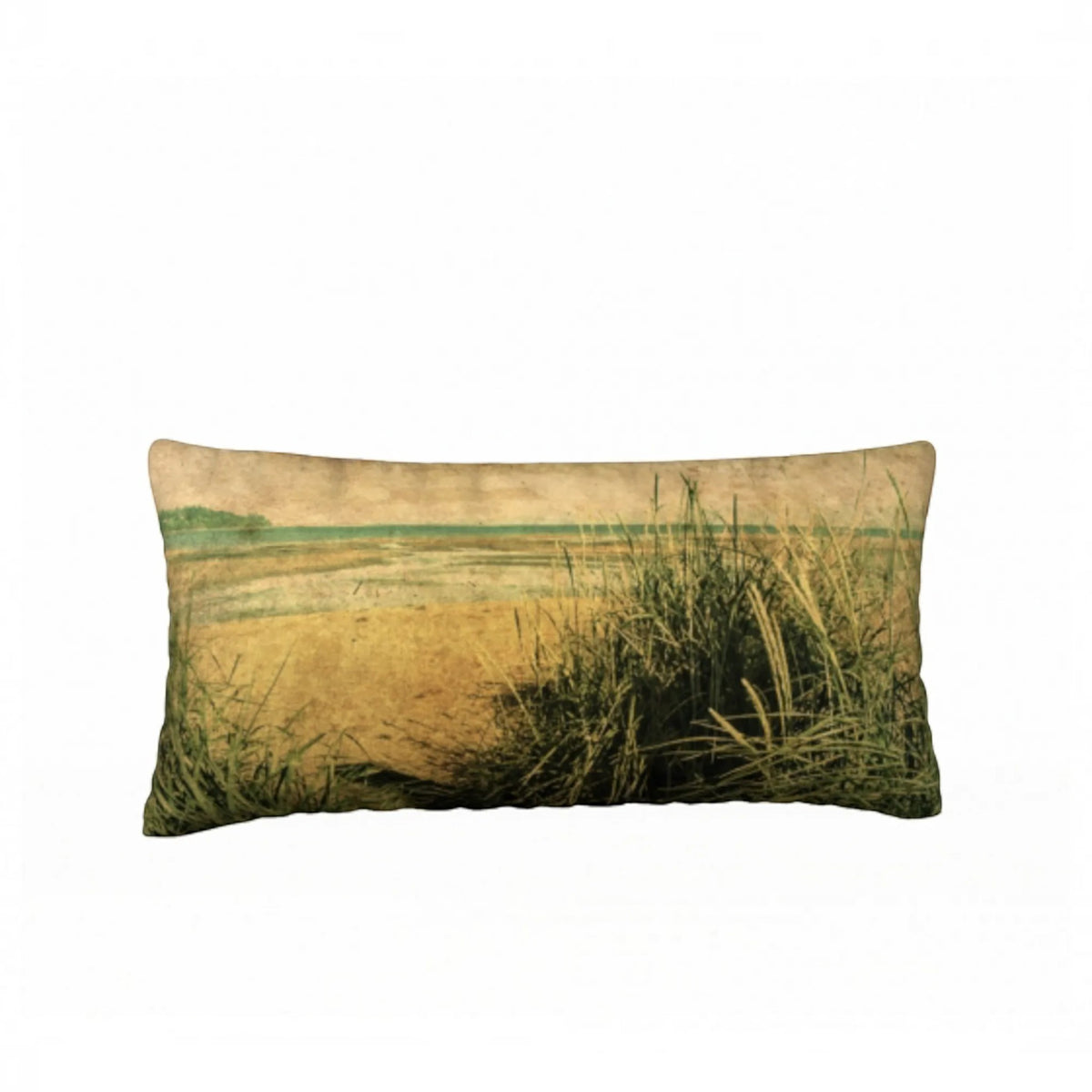 A rectangular lumbar throw pillow featuring a vintage-style landscape print of a beach with tall grasses in the foreground, set against a plain white background.