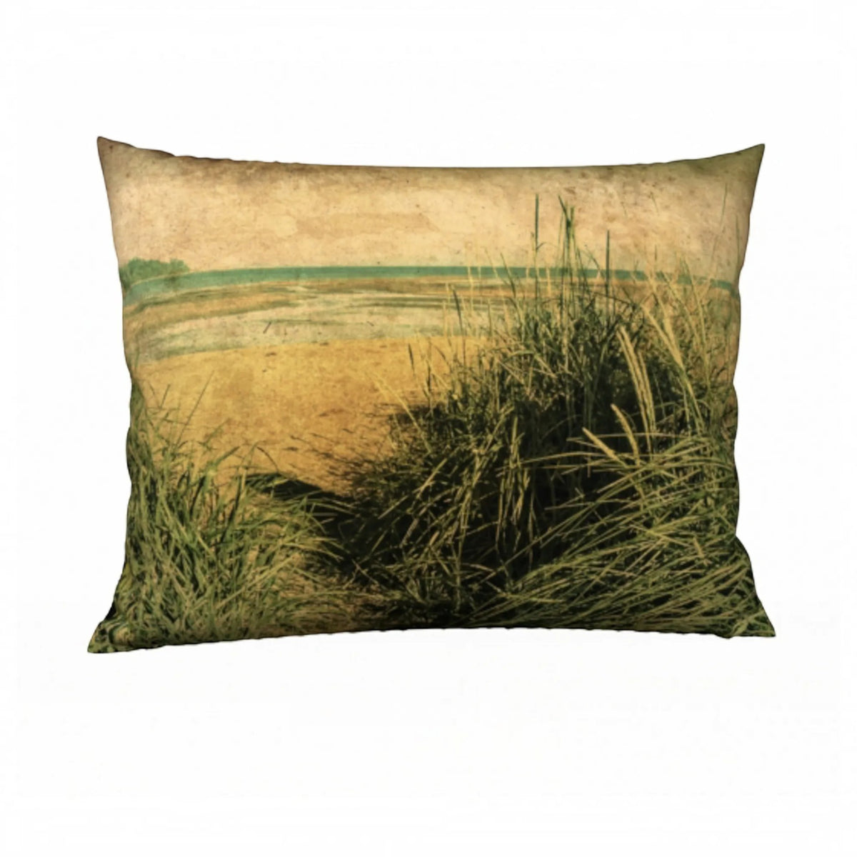 A rectangular decorative throw pillow featuring a vintage-style printed landscape of beach grasses and a distant shoreline, shown against a plain white background.