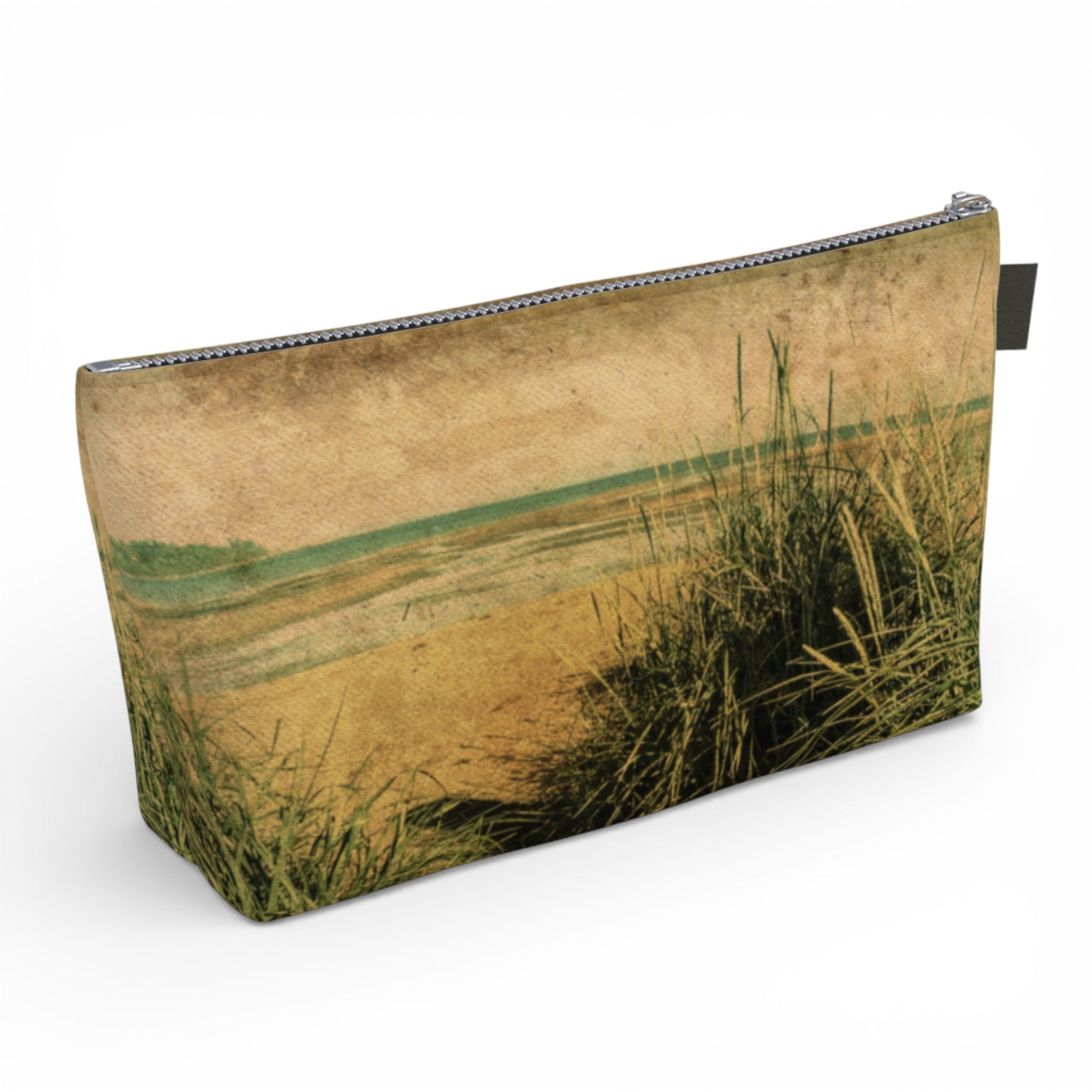 Pouch with a nature-themed design of grass and field on a white background