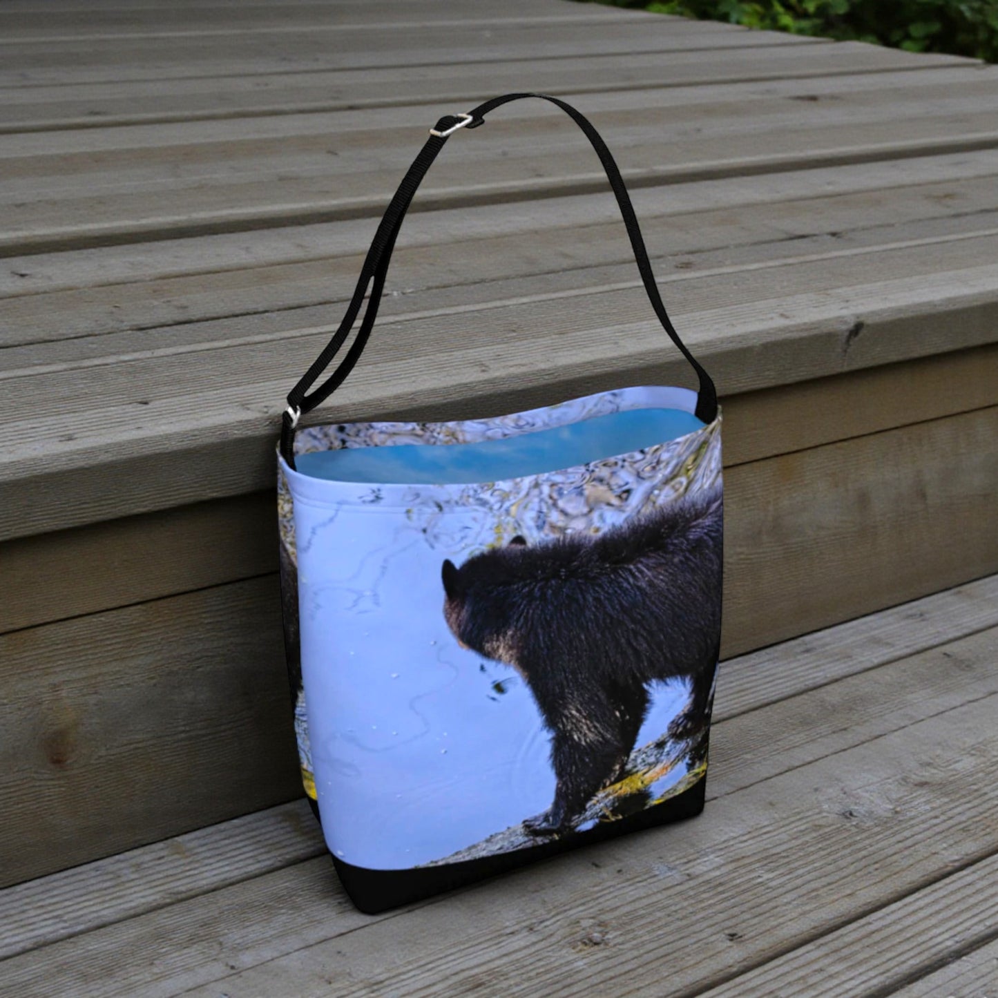 Bag with a bear design on a wooden surface