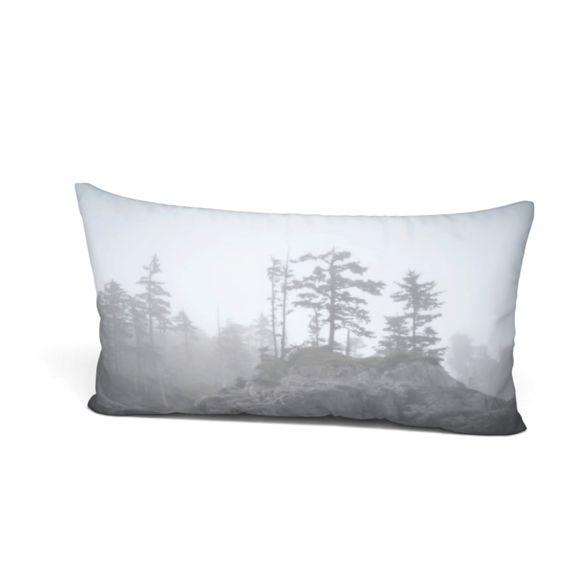 A rectangular lumbar pillow featuring a misty forest landscape print in grayscale, set against a plain white background.