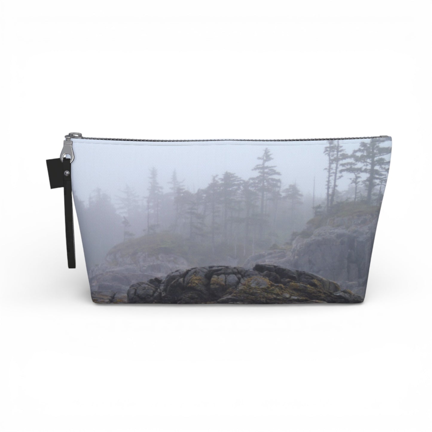 Pouch with a nature-themed design of trees and rocks on a white background