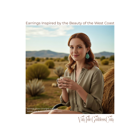 Woman holding a mug with scenic desert background, Van Isle Goddess earrings shown.