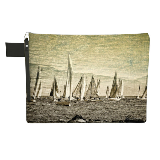 Pouch with sailboat design on a white background