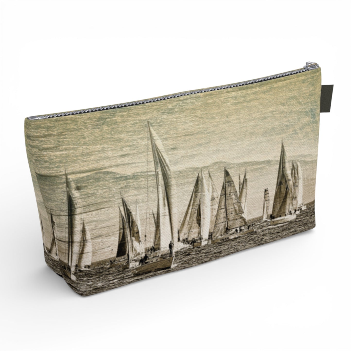 Pouch with sailboat design on a white background