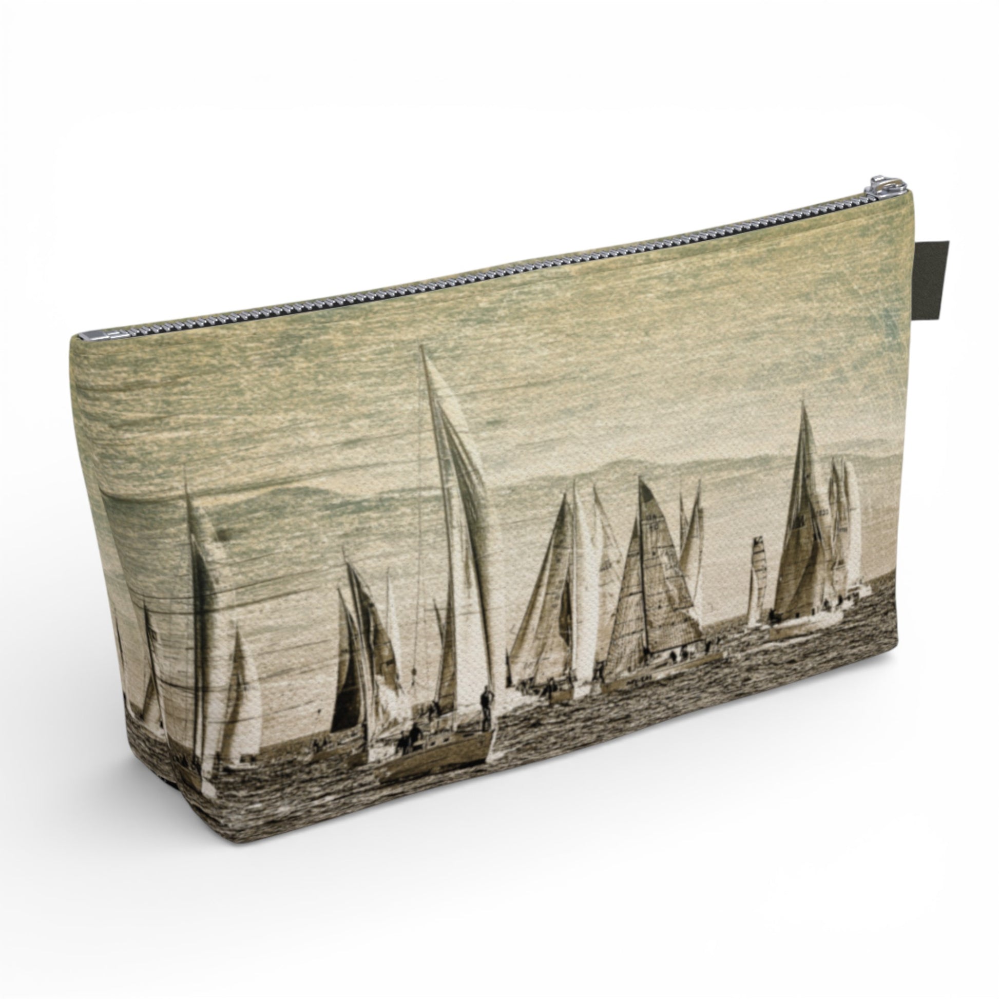 Pouch with sailboat design on a white background