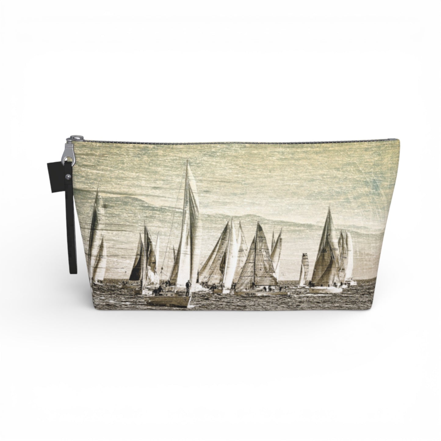Pouch with sailboat design on a white background