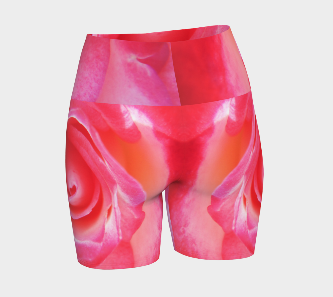 All over print Sparkle Rose Yoga Shorts features a pink rose as the image on the shorts