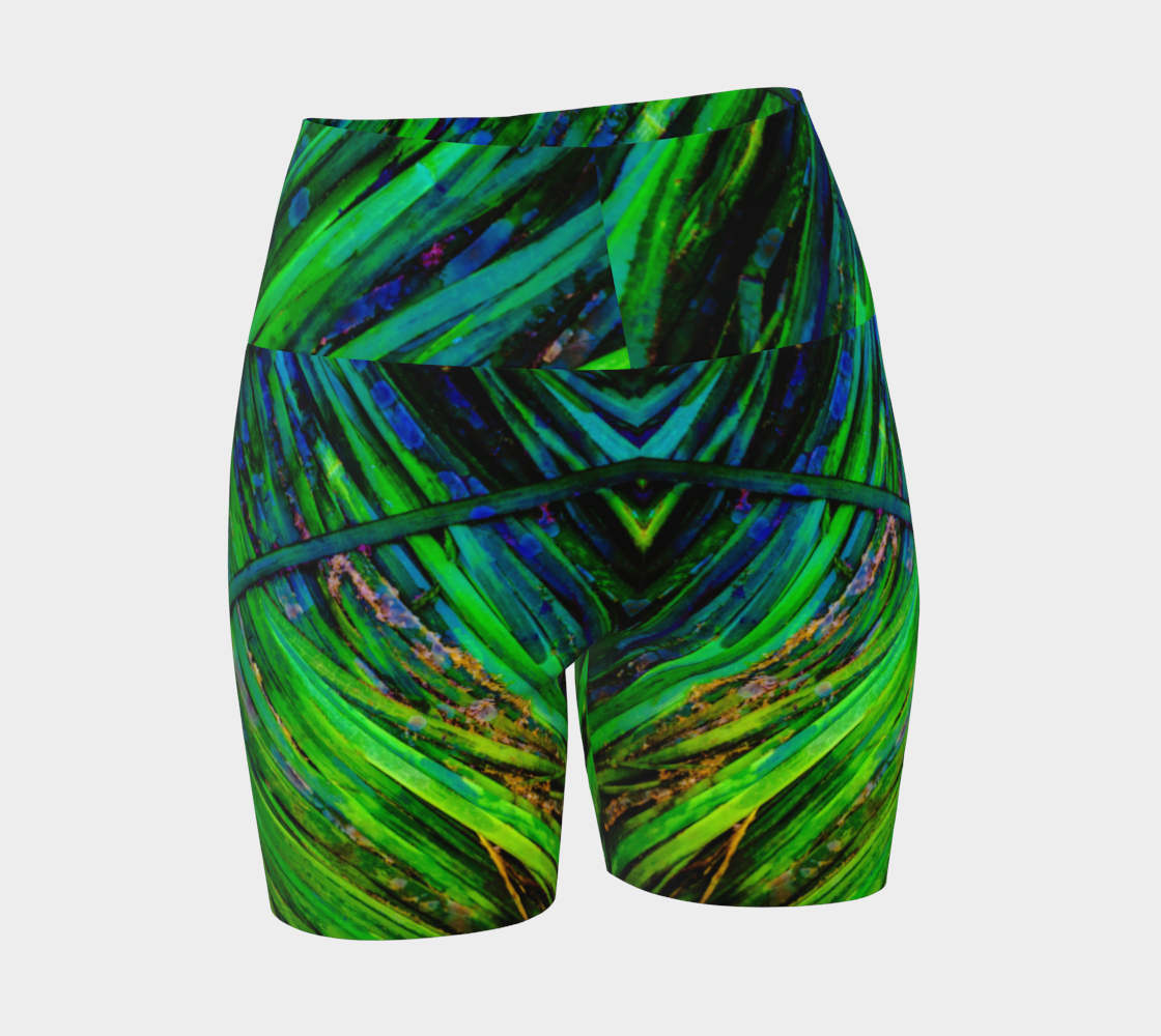 Shades of green yoga shorts feature an all over print of spring ocean sea grass at low tide.