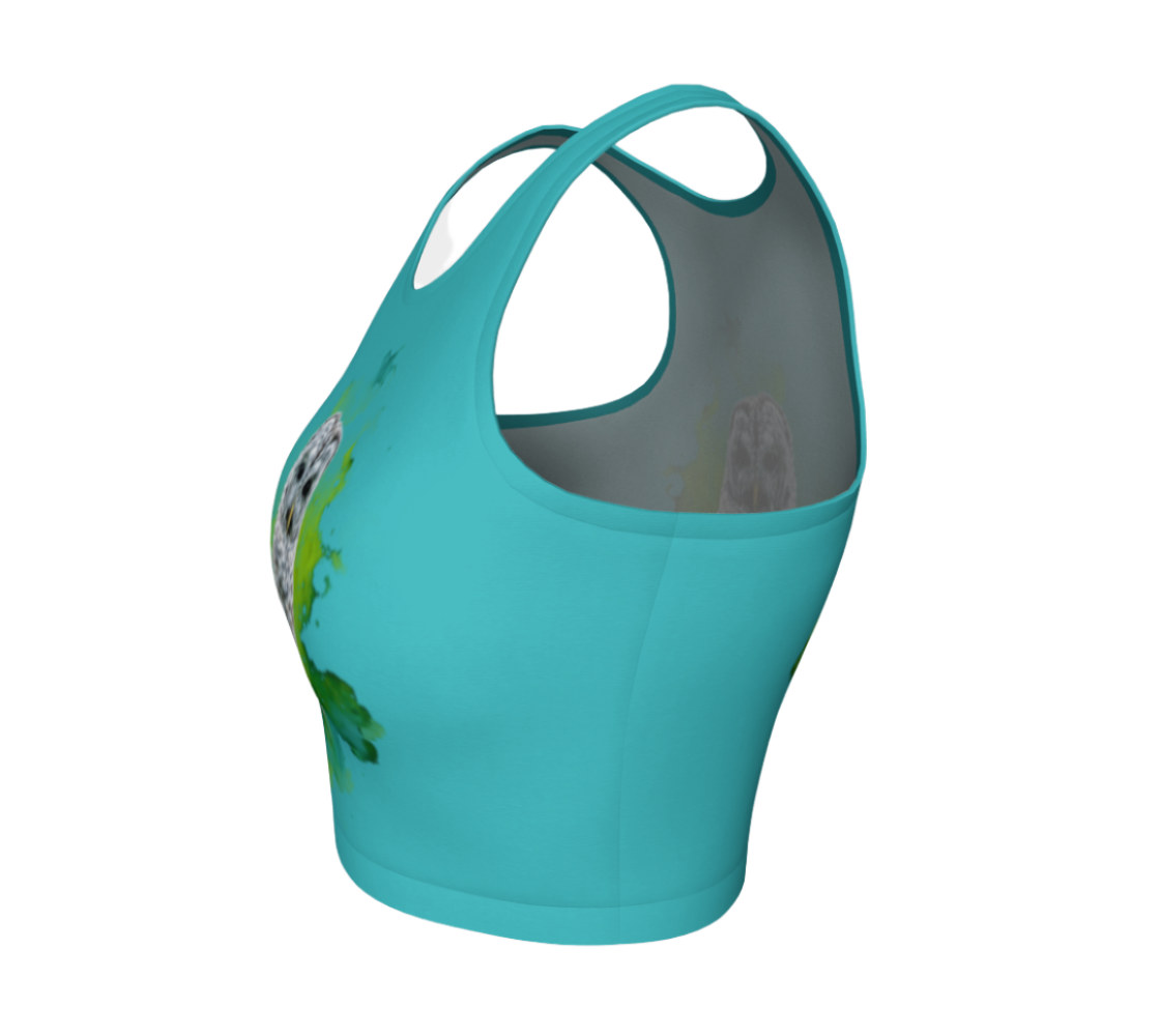Wise owl active crop top features a barred owl with a green abstract background printed on a turquoise top.
