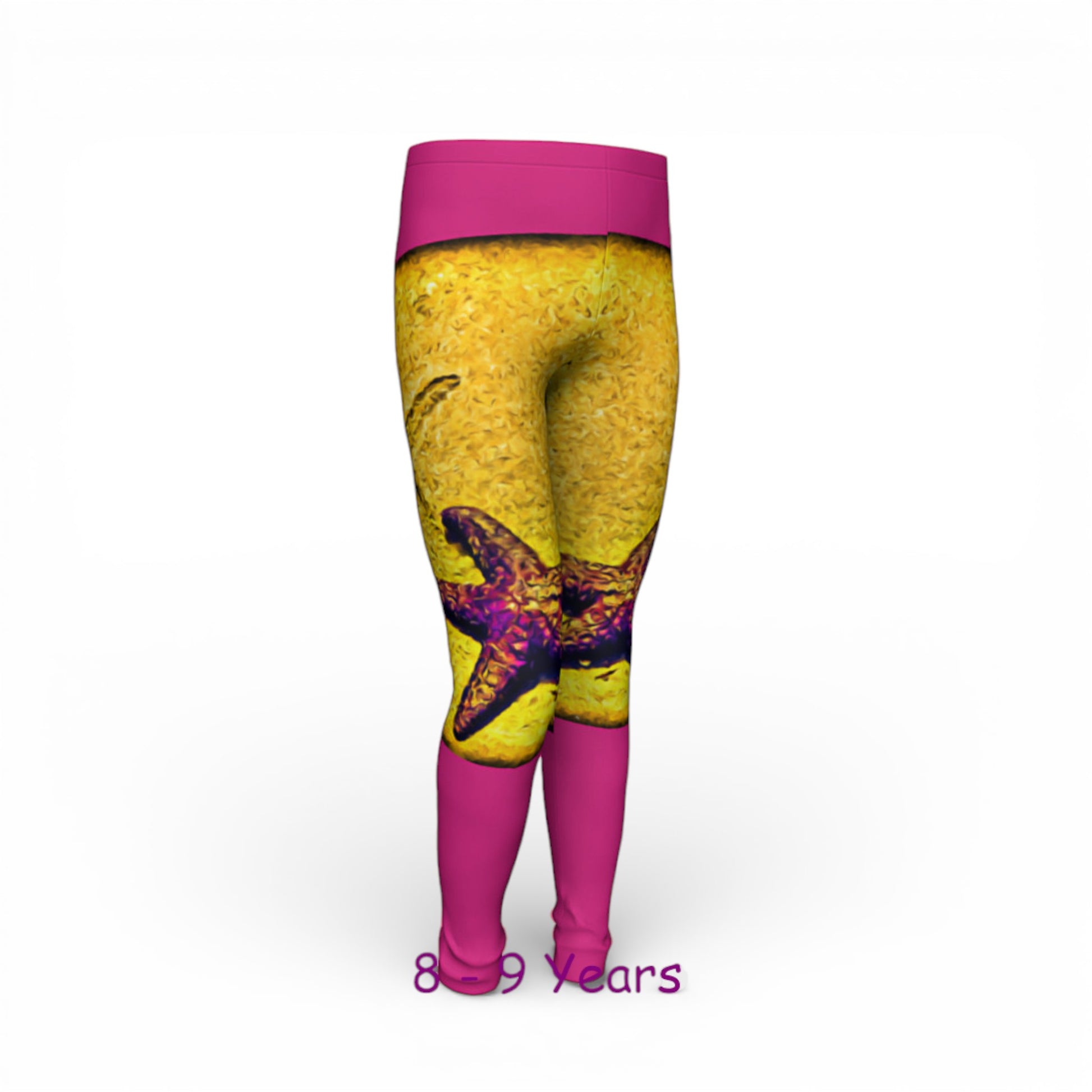 Yellow leggings with a colorful design and pink accents on a white background