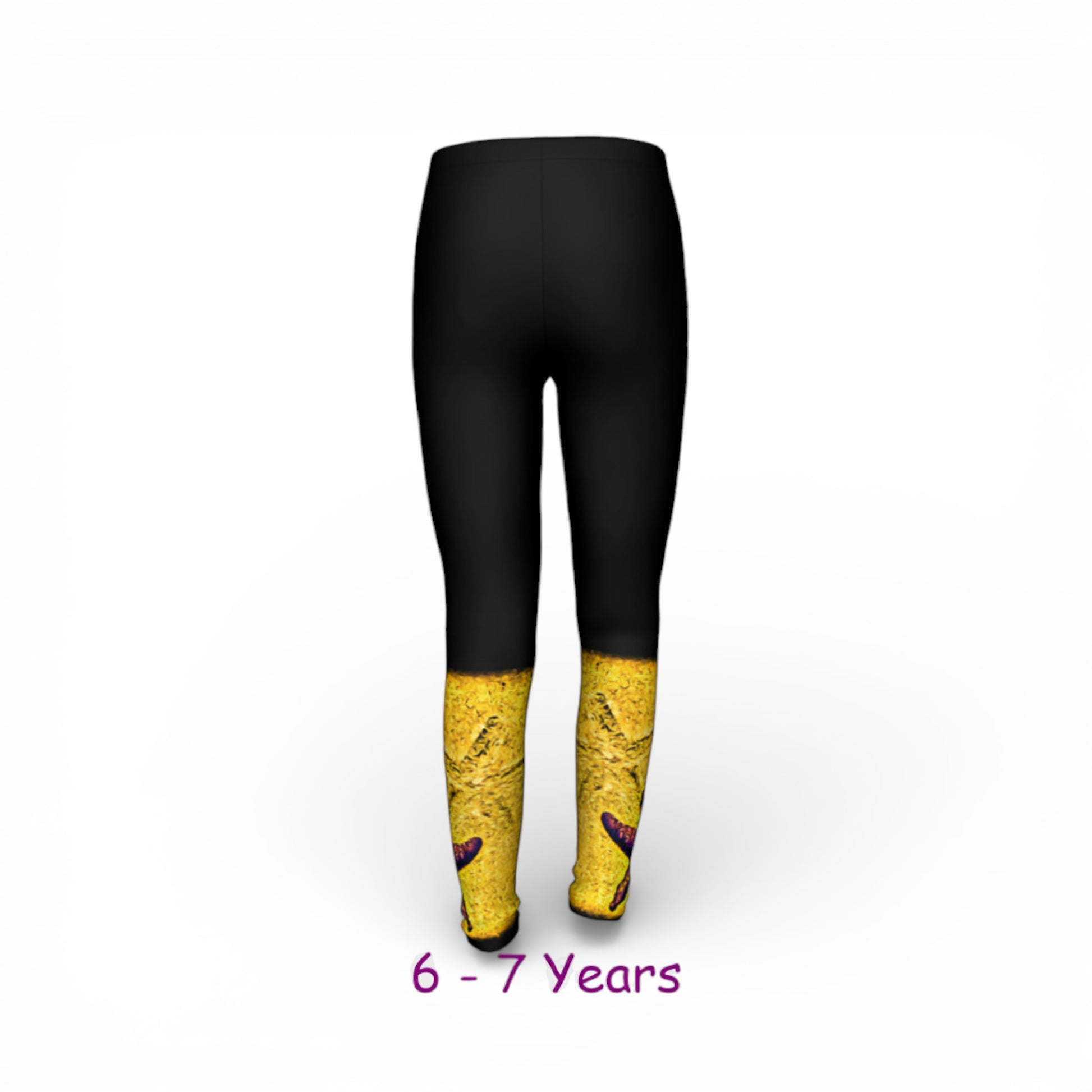 Black leggings with yellow patterned cuffs on a white background