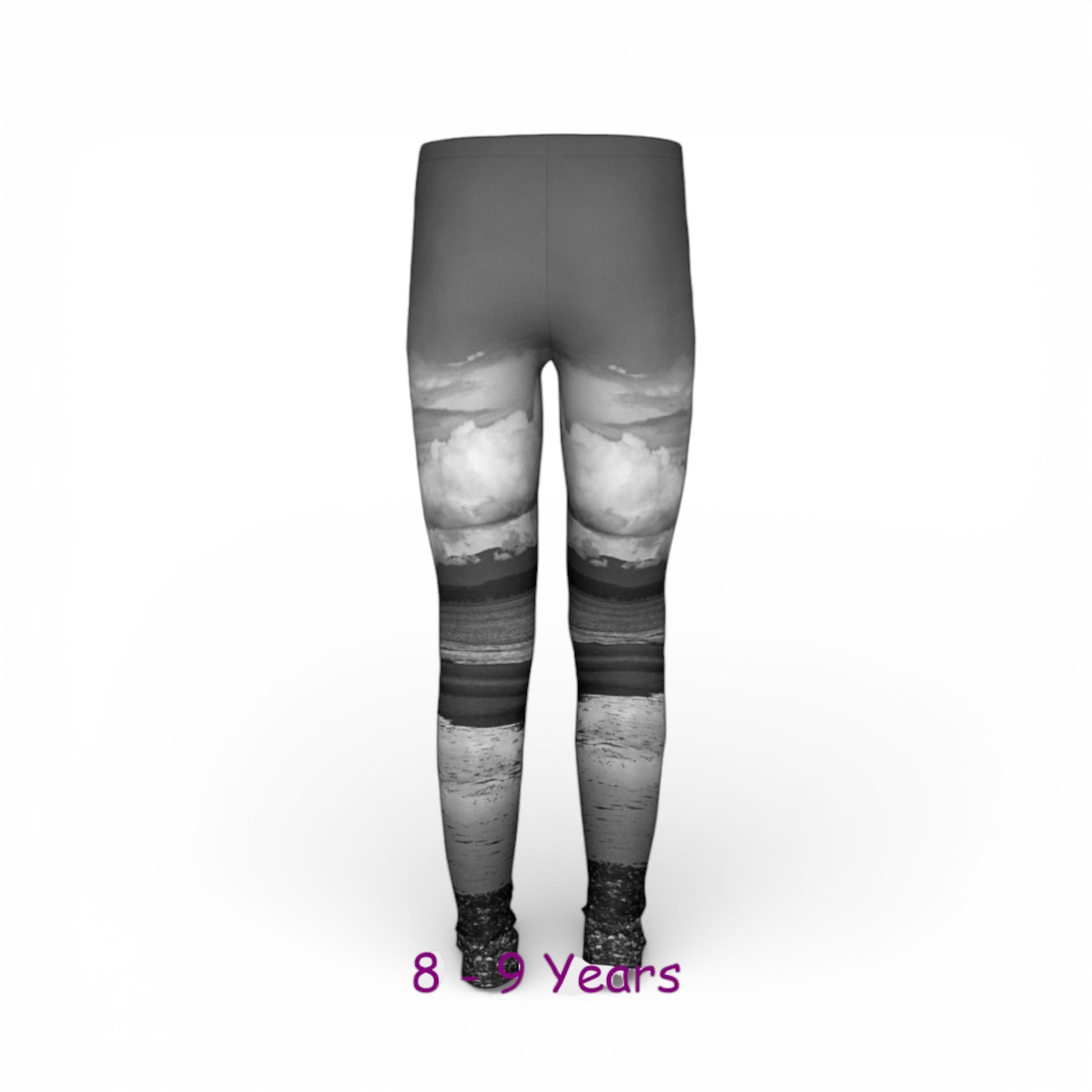 Gray leggings with a mountain landscape design on a white background