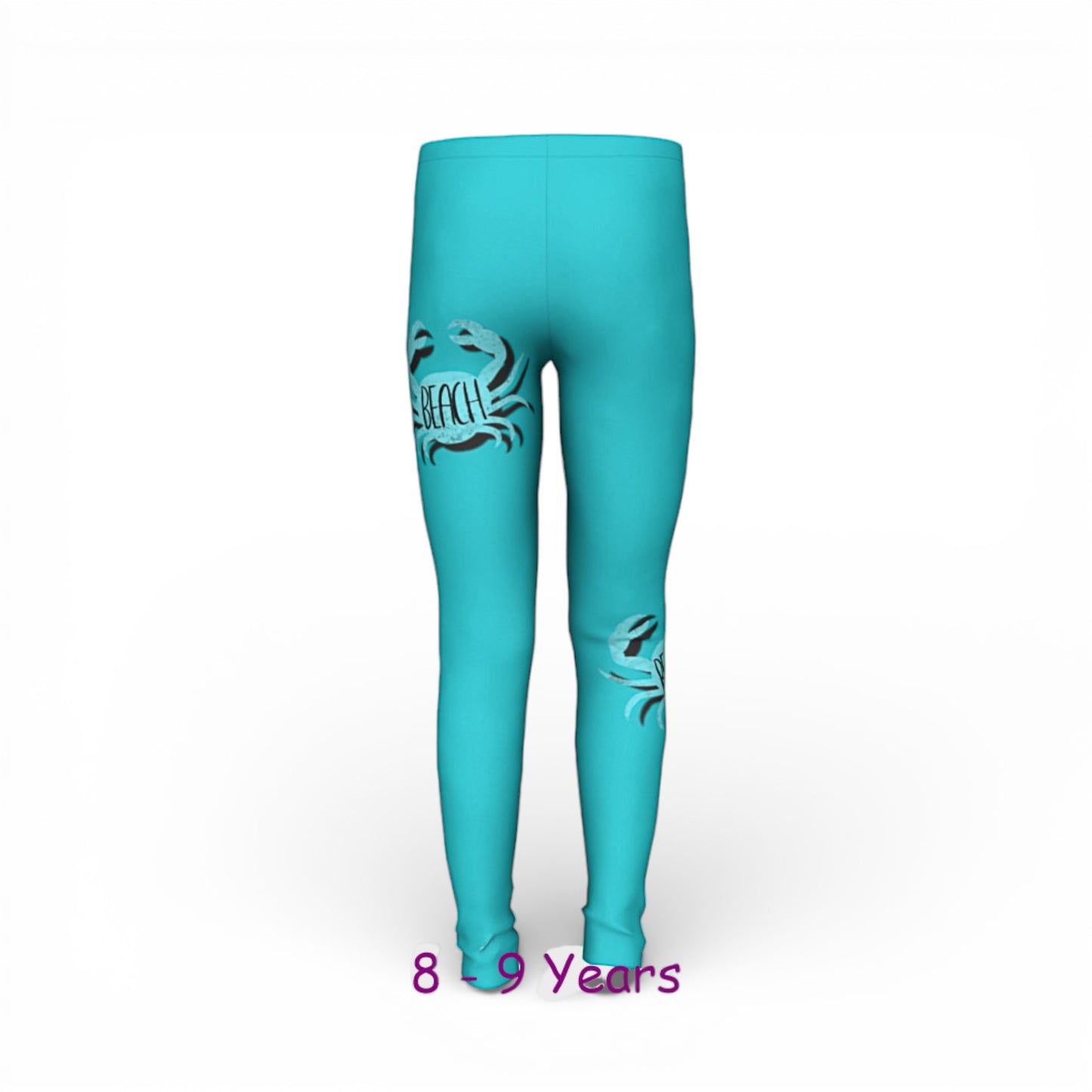 Turquoise leggings with a design on a white background