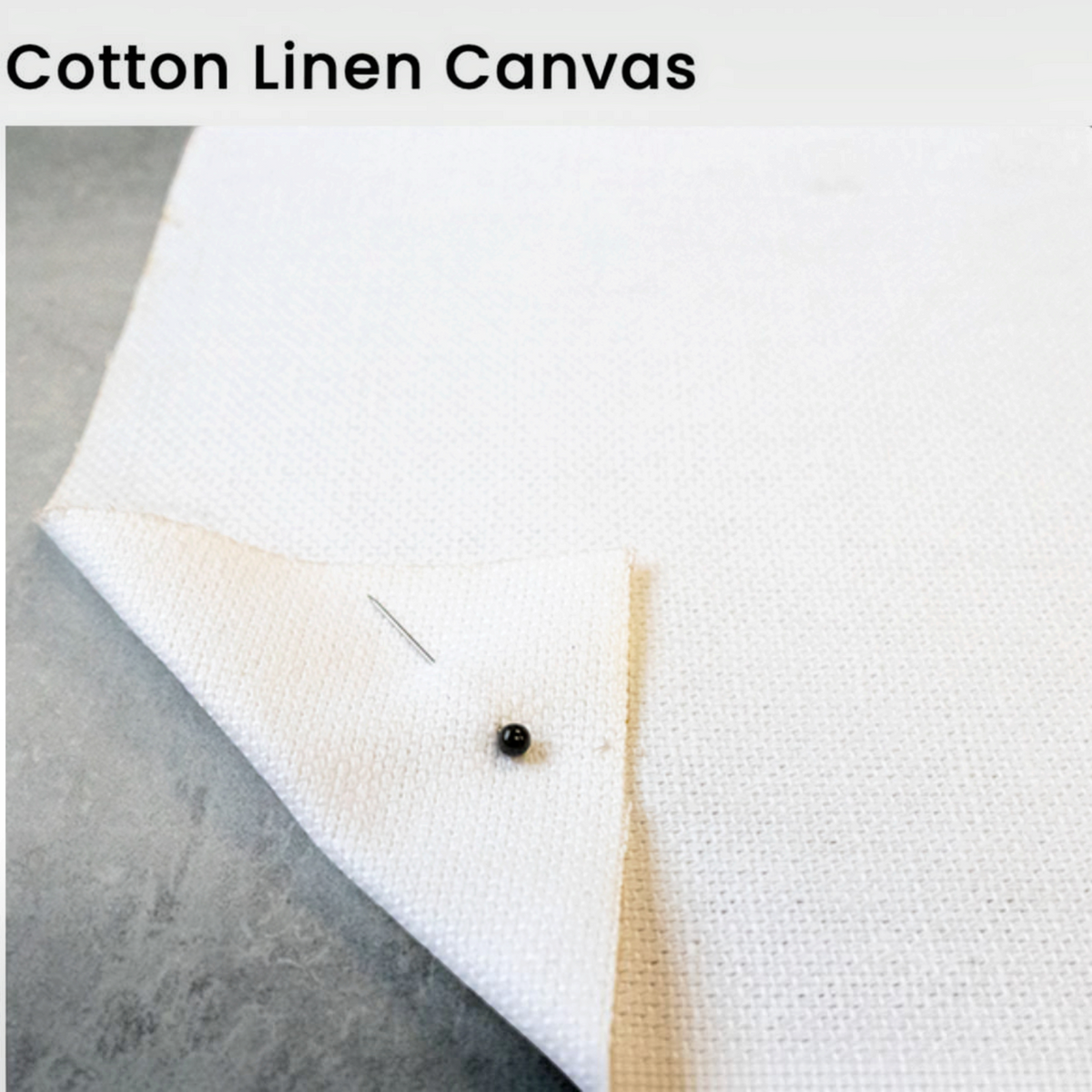 Van Isle Goddess cotton linen canvas fabric swatch with a visible woven texture and a pin detail