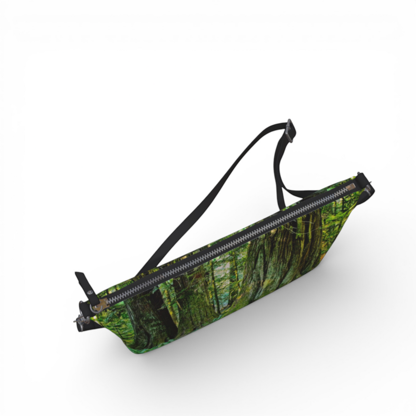 Van Isle Goddess crossbody purse with a forest print, adjustable strap, and metal zipper. Made from vegan leather.