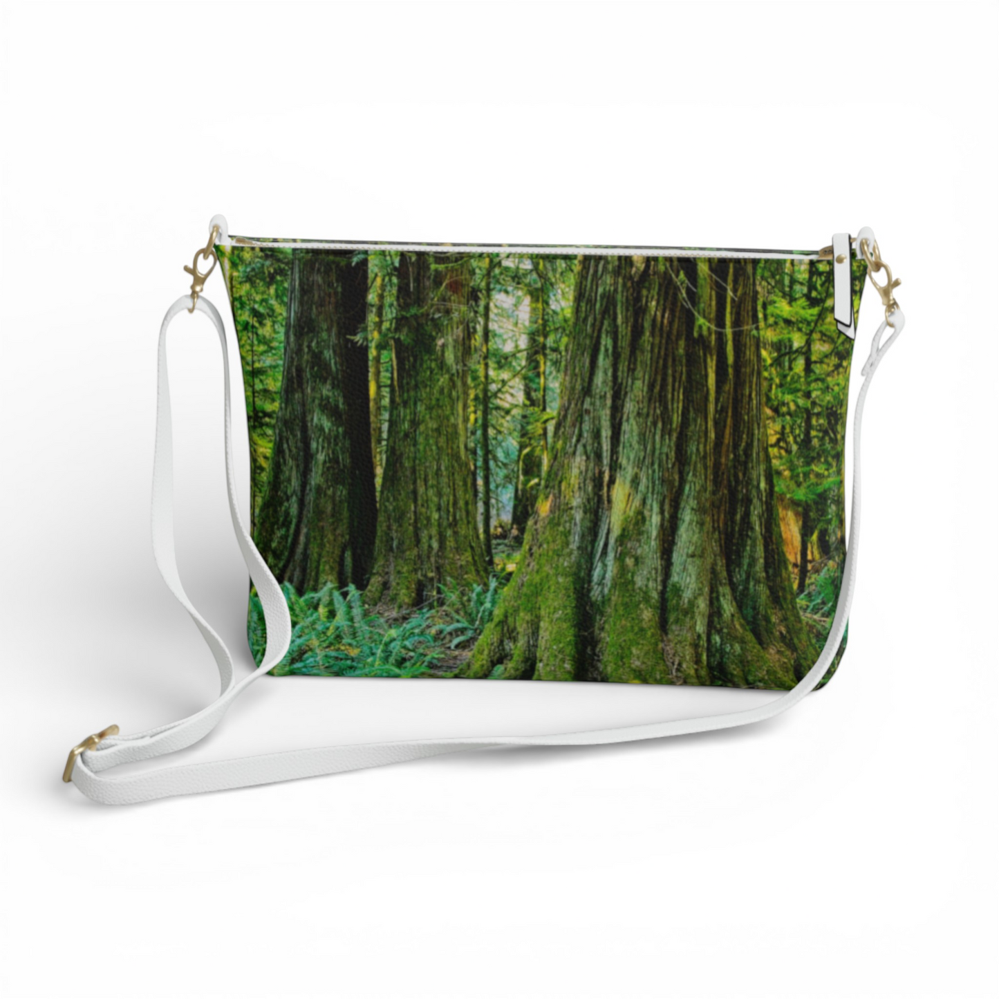 Van Isle Goddess Ancients Cathedral Grove vegan leather crossbody purse with forest print and white strap.
