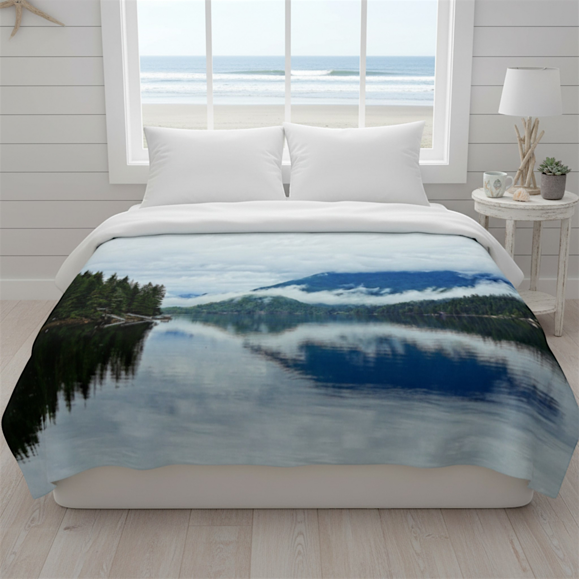 Van Isle Goddess Alberni Inlet Coastal Blanket featuring a serene lake reflecting misty mountains and lush green trees. Made of plush polyester.