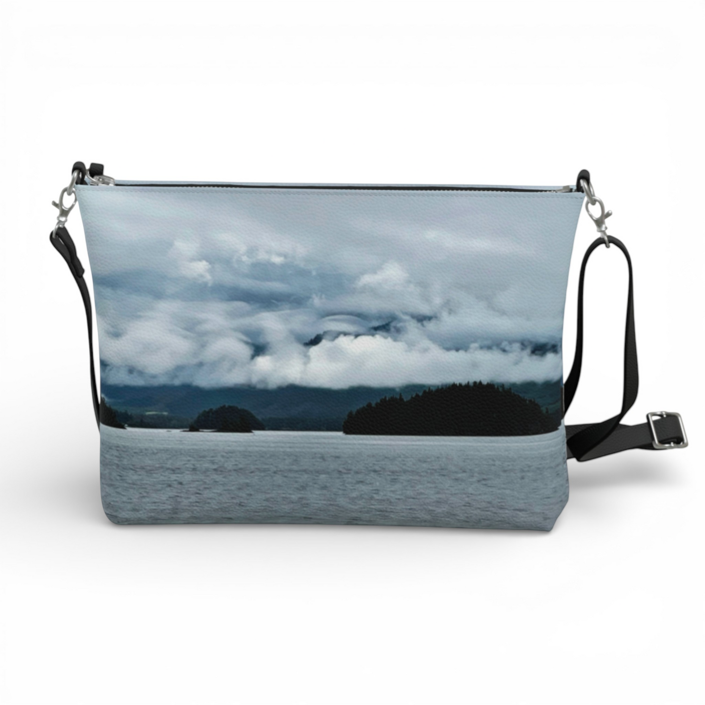 Van Isle Goddess Alberni Inlet crossbody purse with a cloudy, mountainous landscape print. Vegan leather with adjustable strap.