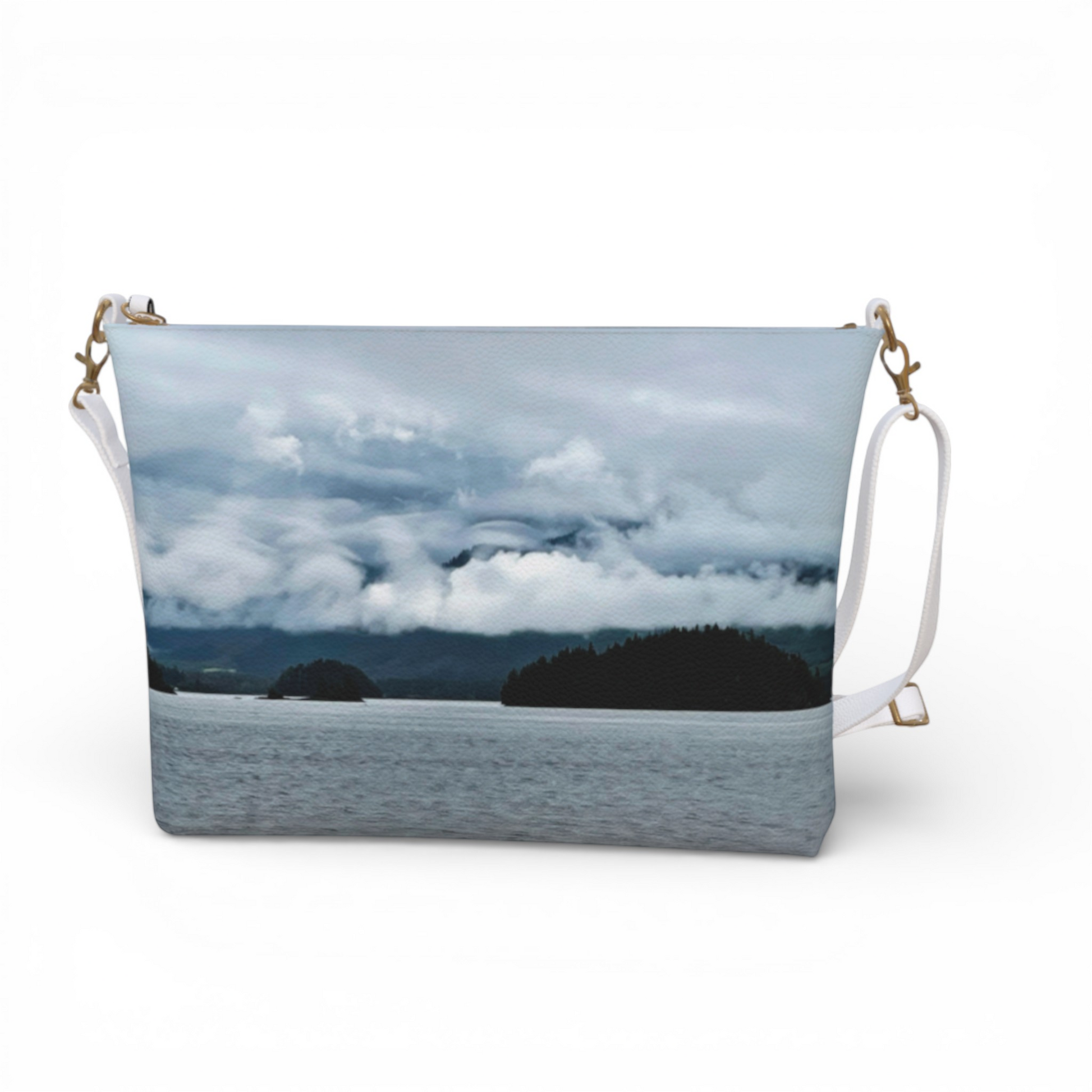 Van Isle Goddess Alberni Inlet crossbody purse in vegan leather with a scenic water and cloudy mountain print. Features a white strap.