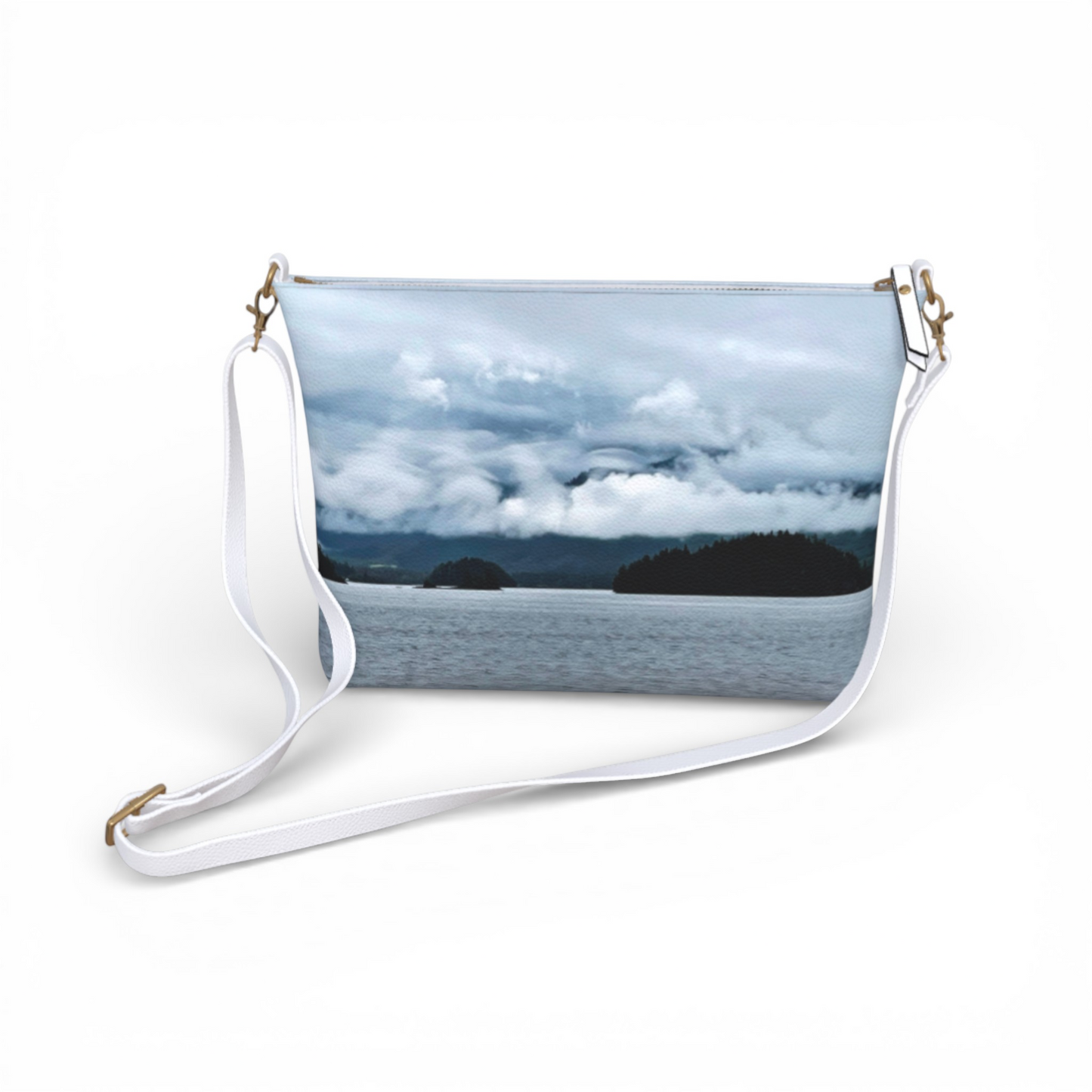 Van Isle Goddess Alberni Inlet crossbody purse with a scenic water and cloudy sky print, vegan leather, adjustable strap.