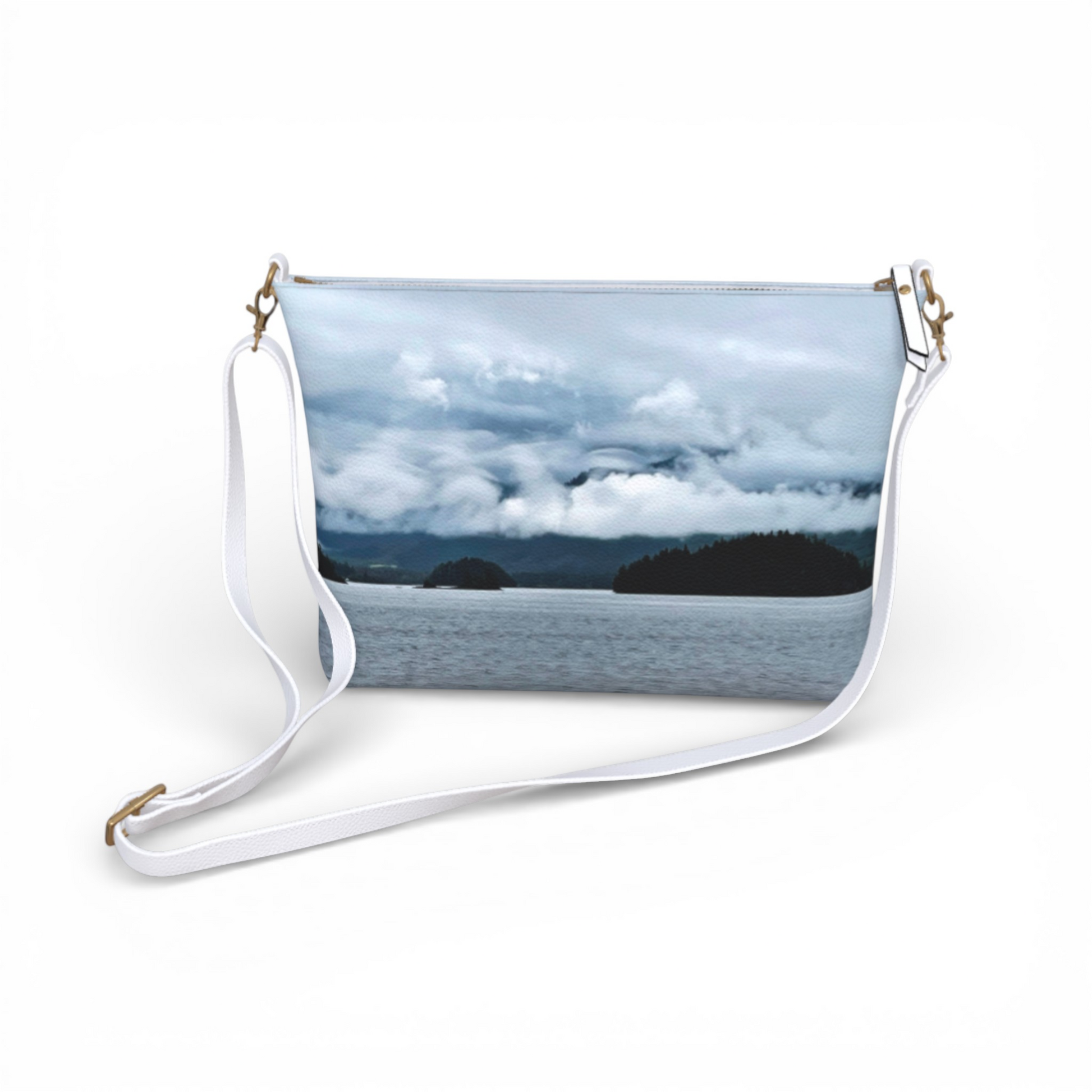 Van Isle Goddess Alberni Inlet crossbody purse with a scenic water and cloudy sky print, vegan leather, adjustable strap.