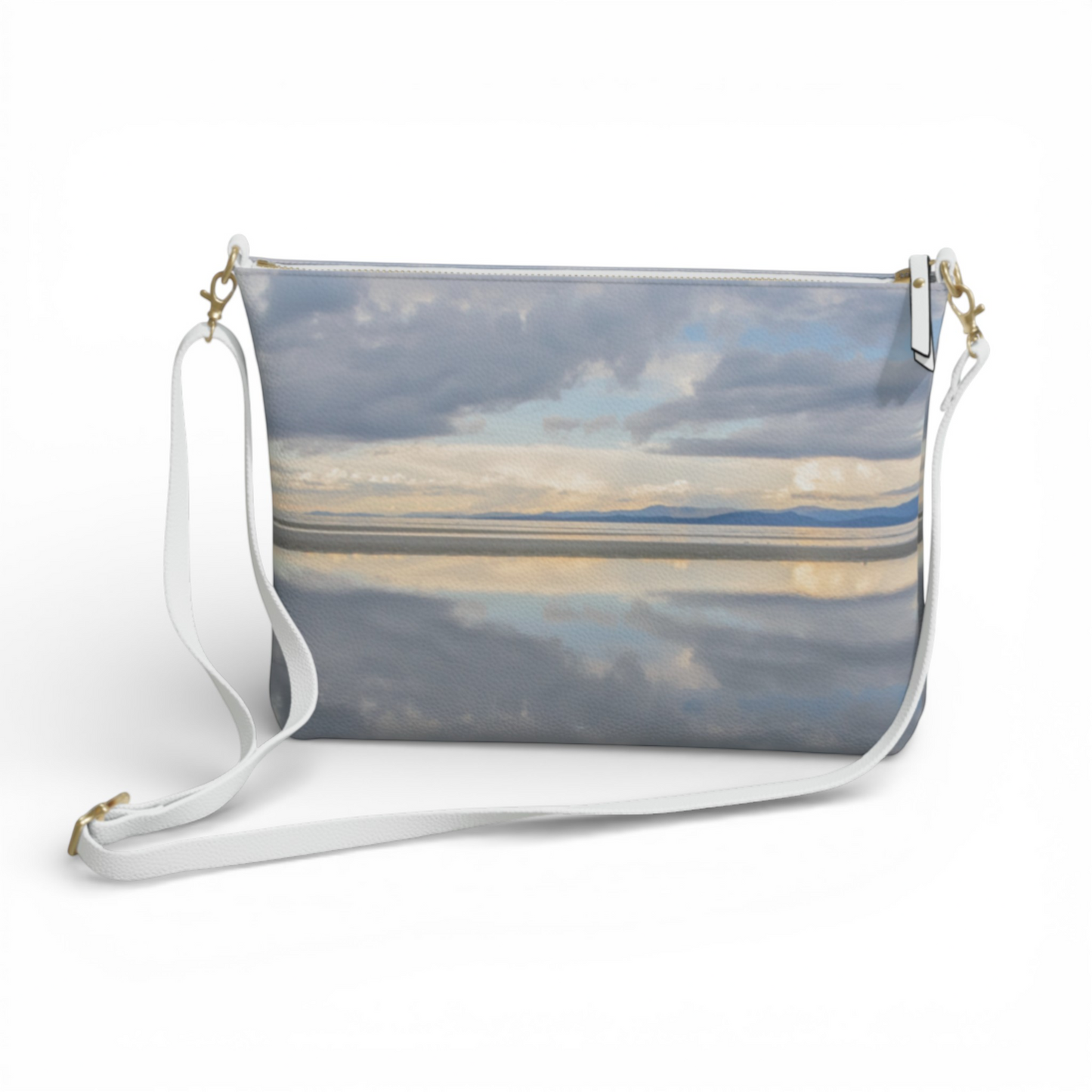 Van Isle Goddess crossbody purse with a beach landscape print, vegan leather, and adjustable white strap.
