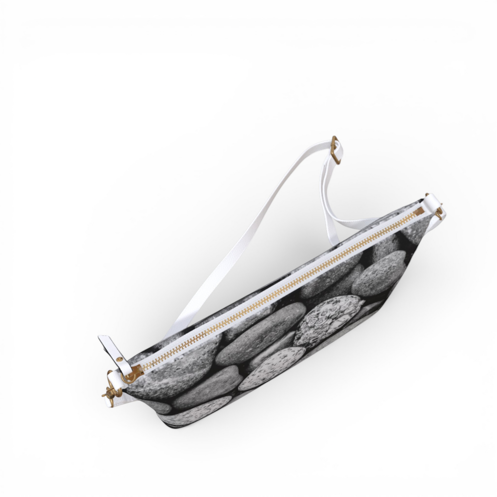 Van Isle Goddess Beach Rocks vegan leather crossbody purse with adjustable white strap and gold zipper.