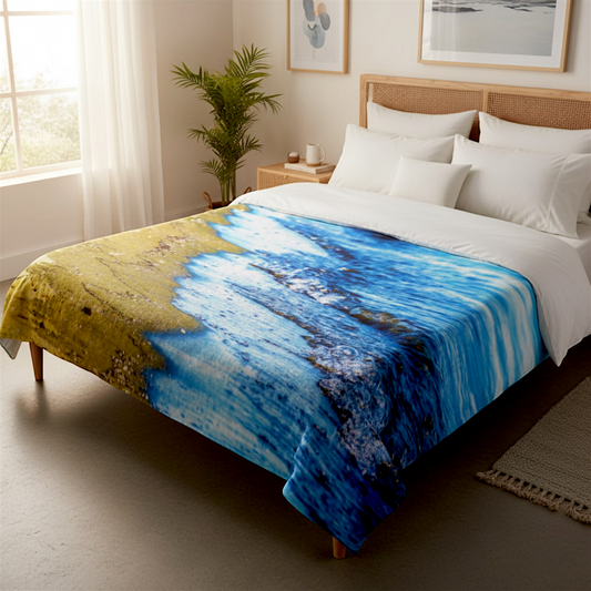 Van Isle Goddess beach wave blanket with blue ocean water and sandy shore. Double-thick minky polyester fabric.