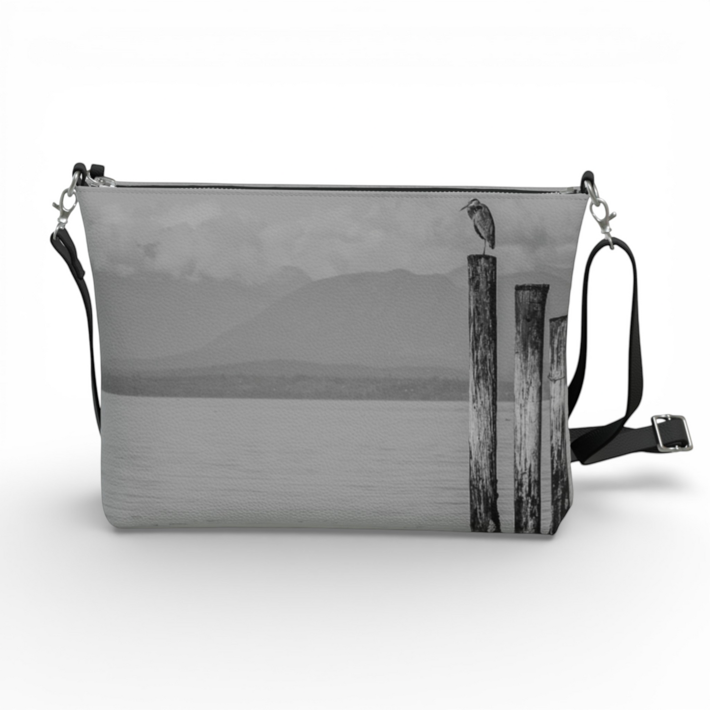 Van Isle Goddess Blue Heron Perch vegan leather crossbody purse with adjustable strap and metal hardware.