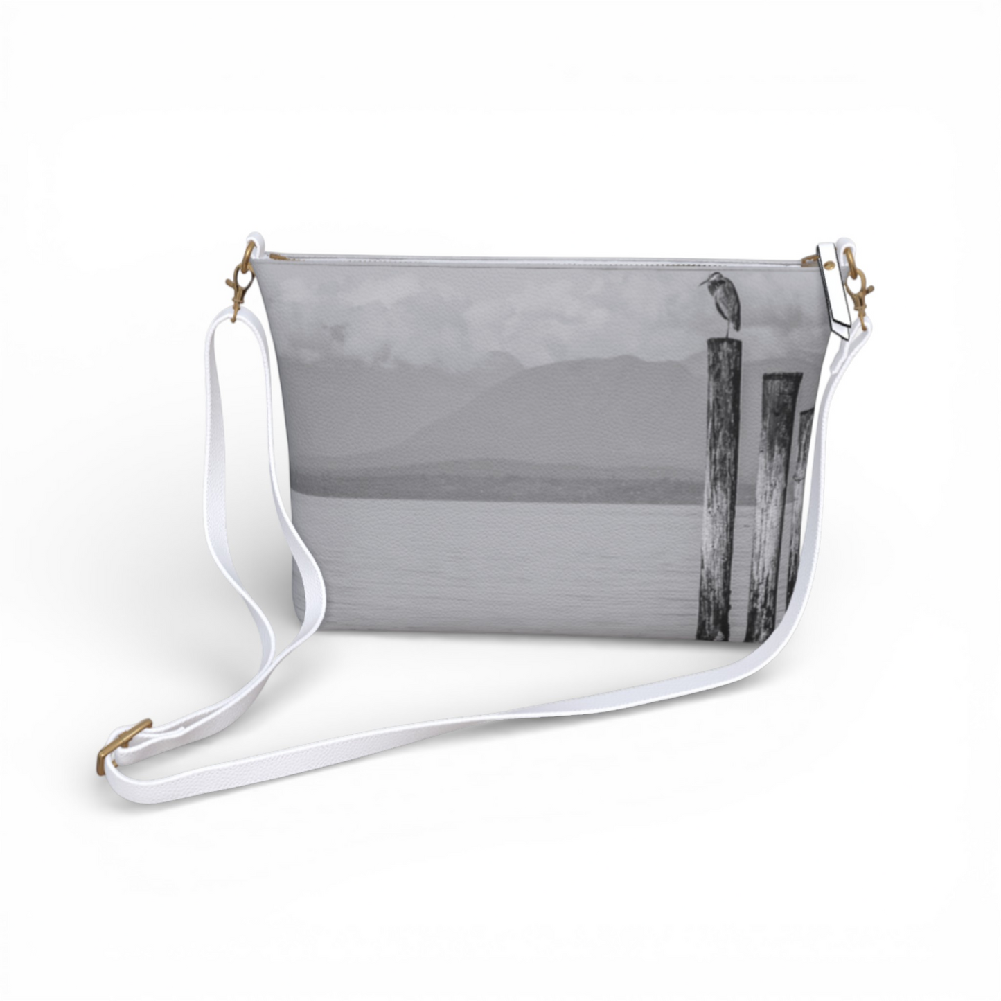 Van Isle Goddess Blue Heron Perch vegan leather crossbody purse with adjustable white strap and metal hardware.