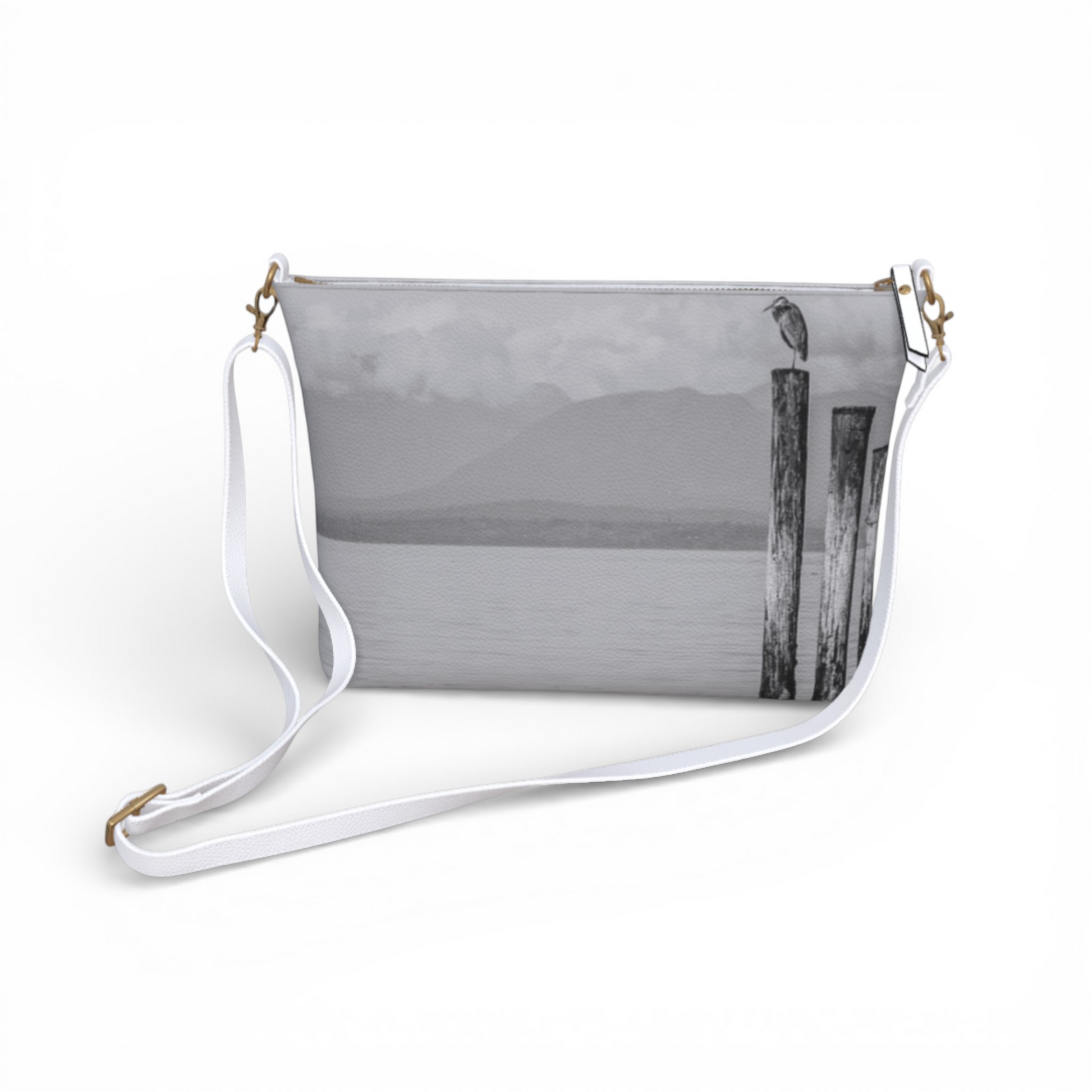 Van Isle Goddess Blue Heron Perch vegan leather crossbody purse with adjustable white strap and metal hardware.