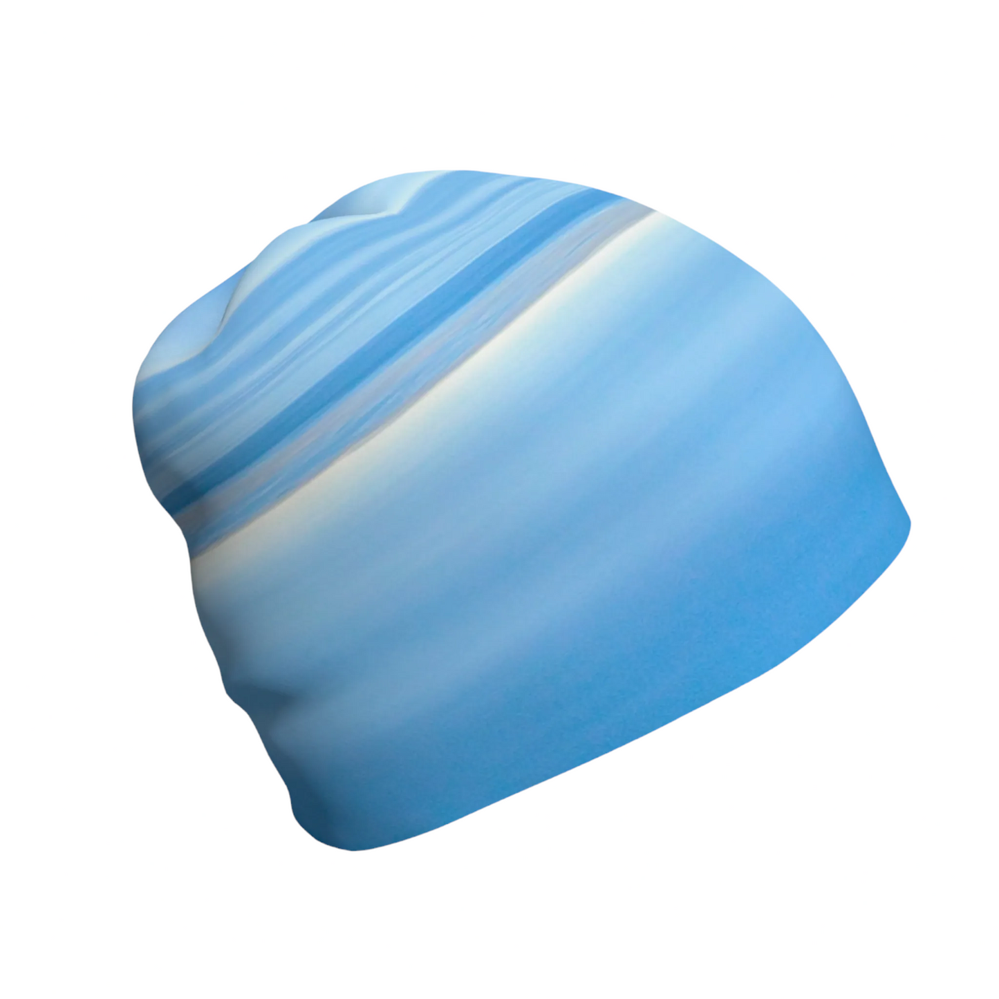 Van Isle Goddess slouchy beanie with abstract blue and white ocean wave pattern. Polyester-spandex blend with bamboo lining.