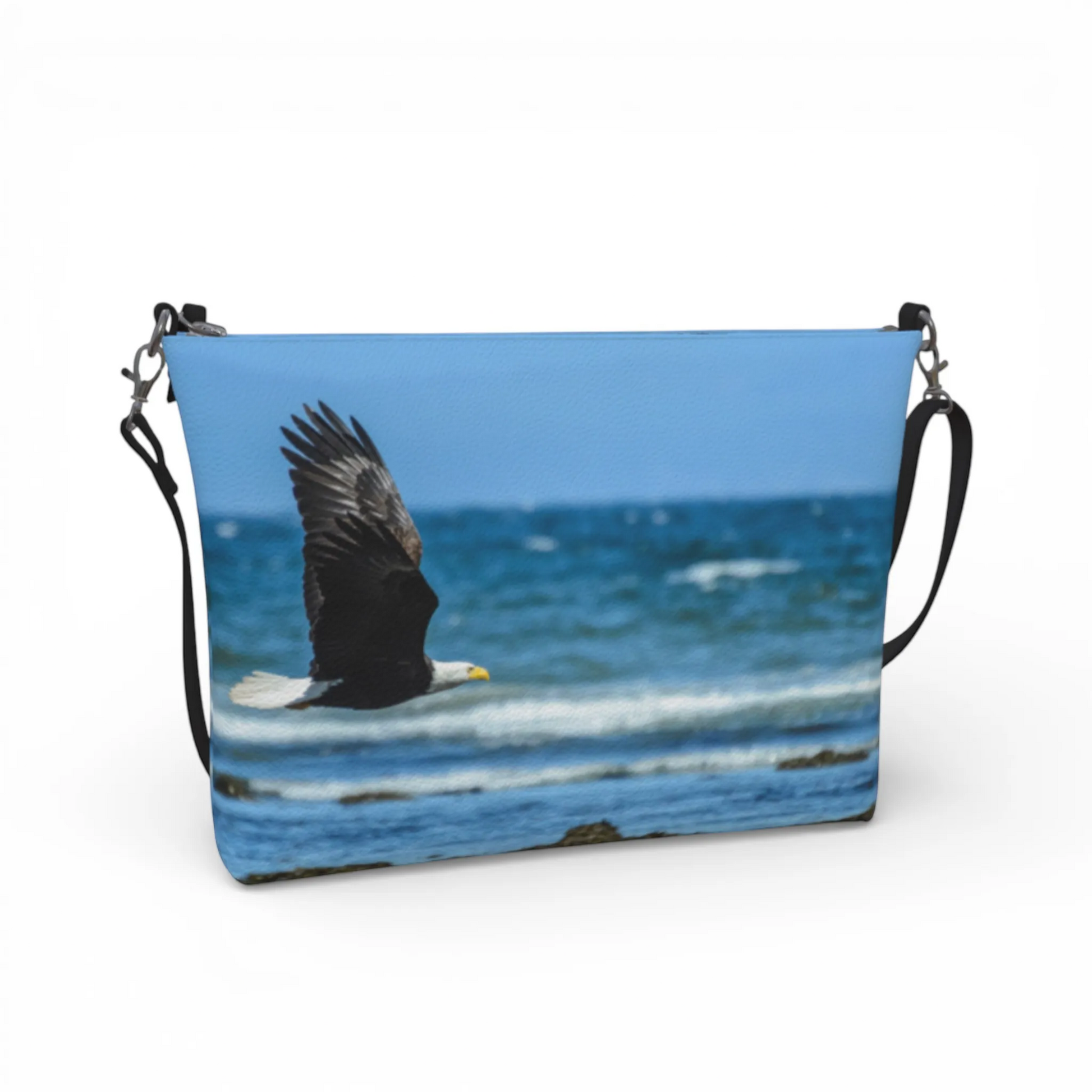 Van Isle Goddess vegan leather crossbody purse with eagle in flight over ocean graphic. Adjustable strap.