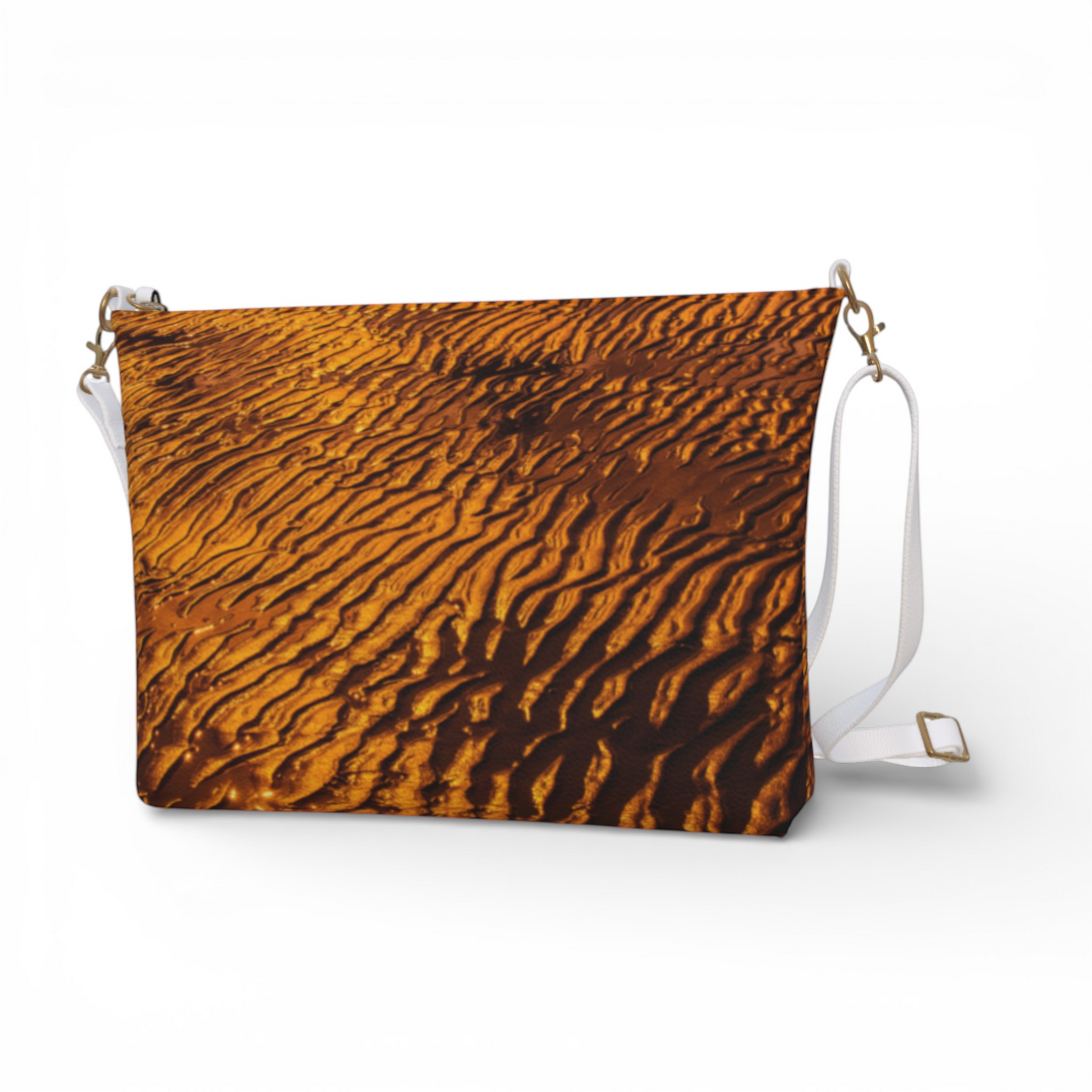 Van Isle Goddess golden sand vegan leather crossbody purse with adjustable white strap and gold hardware.