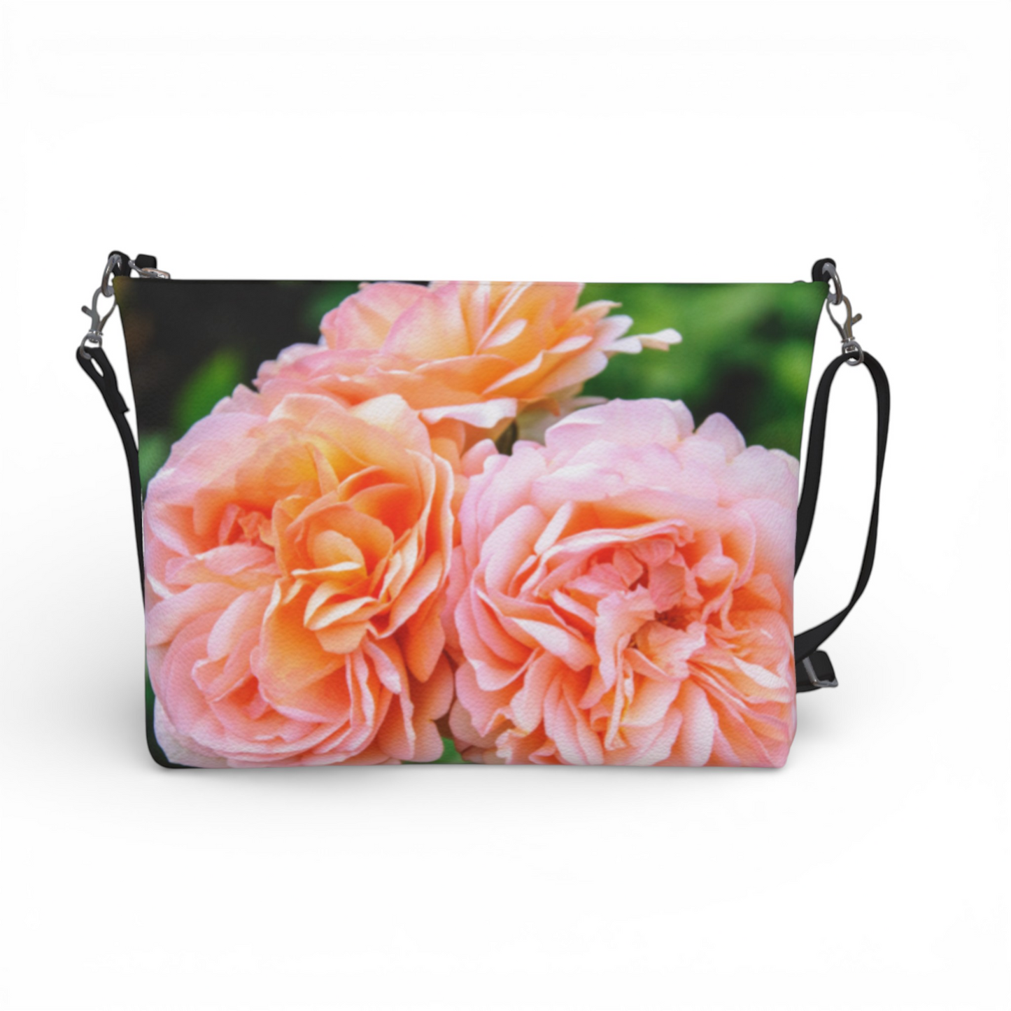 Van Isle Goddess Happy Roses crossbody purse in vegan leather with adjustable strap and a floral print of pink and orange roses.