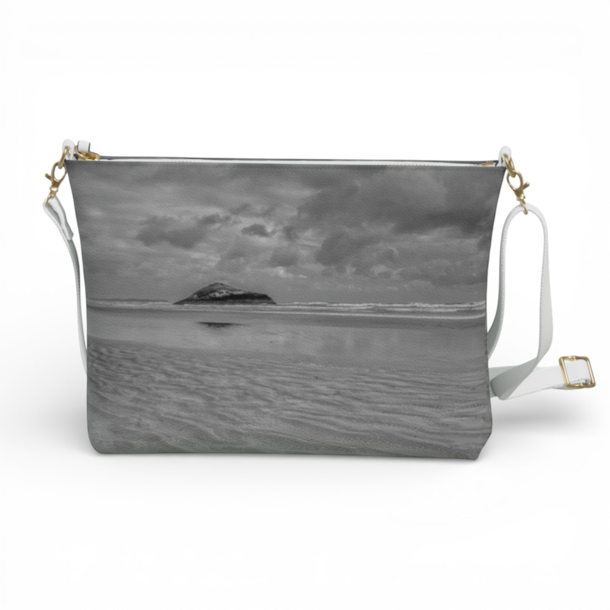 Van Isle Goddess Long Beach Tofino crossbody purse in vegan leather with a black and white beach landscape print and white adjustable strap.