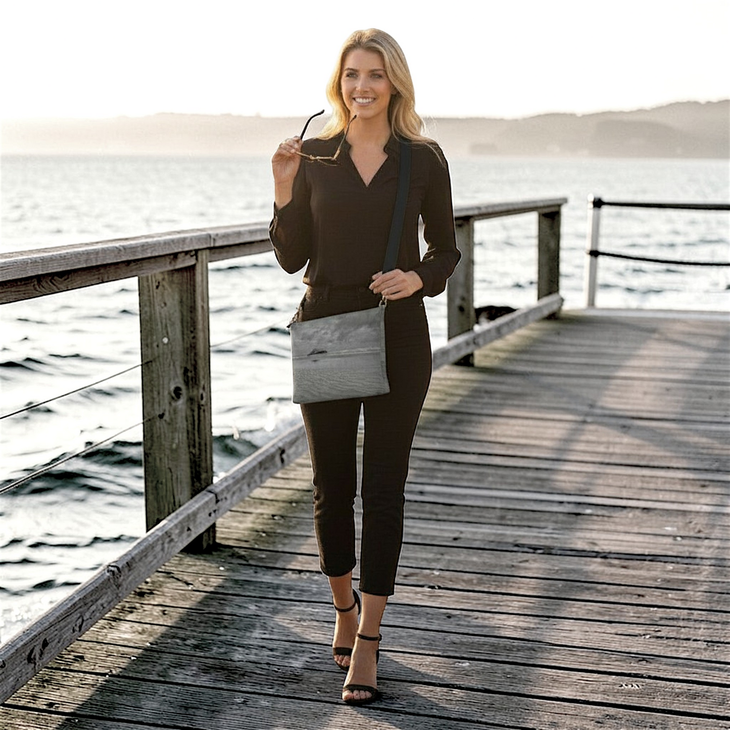 Van Isle Goddess Long Beach Tofino vegan leather crossbody purse with adjustable strap and zipper closure.