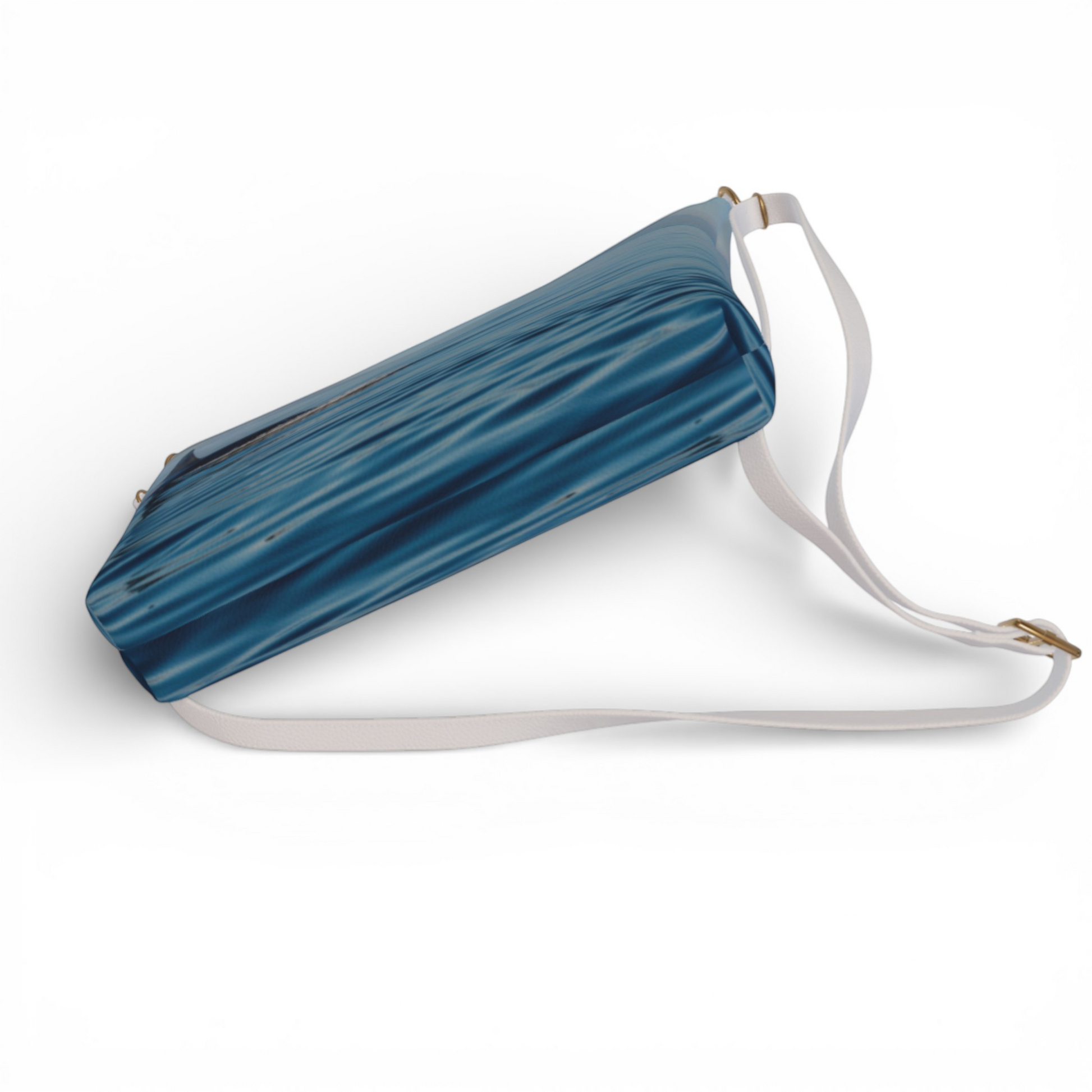 Van Isle Goddess Orca Spray blue vegan leather crossbody purse with adjustable white strap.