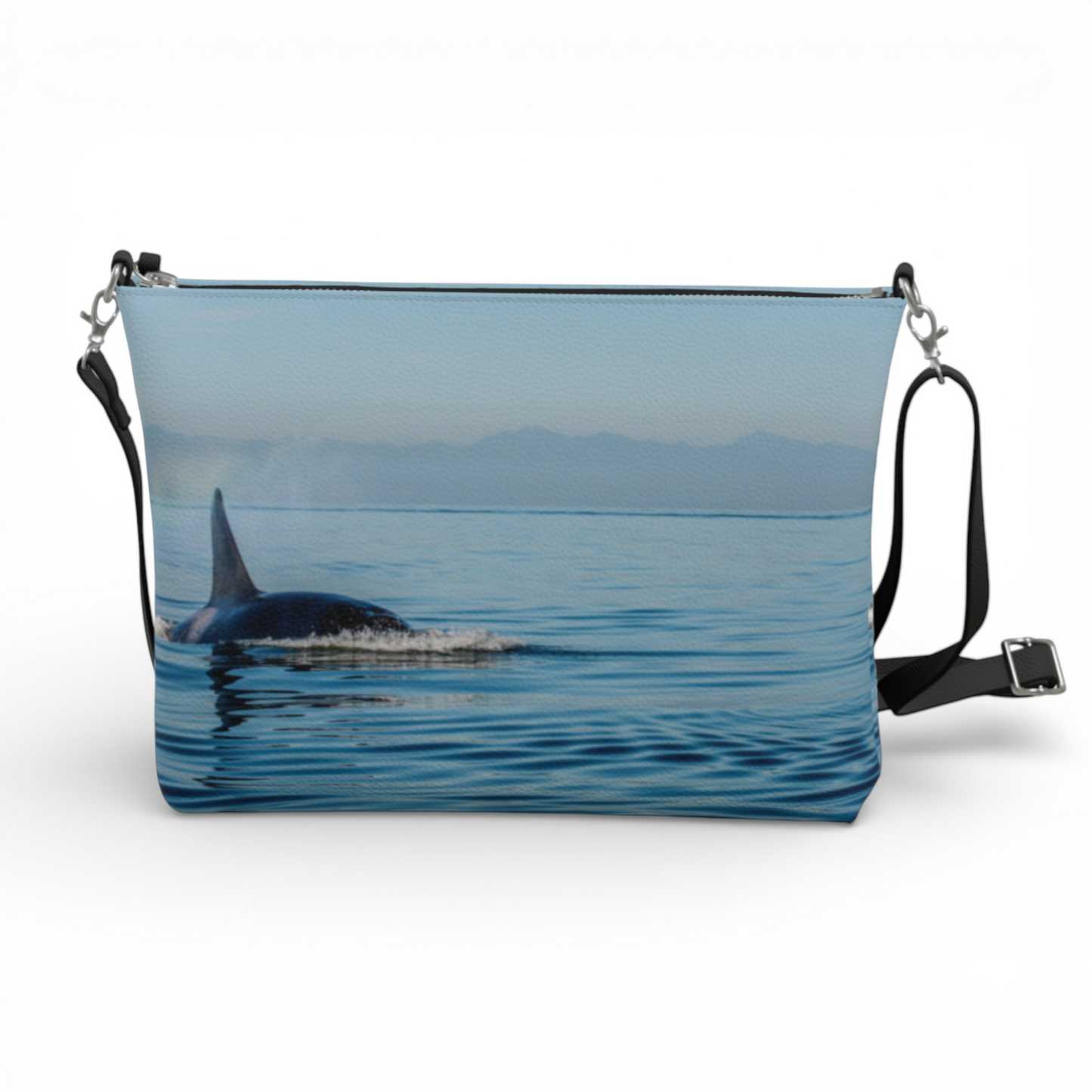 Van Isle Goddess Orca Spray vegan leather crossbody purse with adjustable strap and ocean scene print.