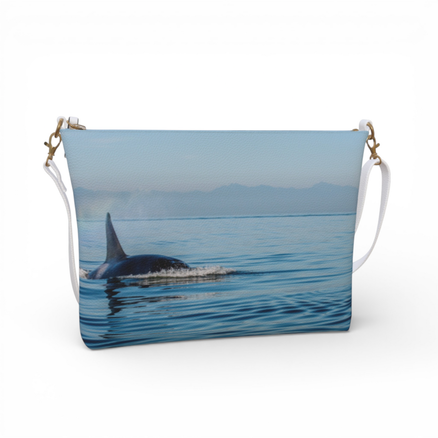 Van Isle Goddess Orca Spray vegan leather crossbody purse with adjustable white strap and orca whale graphic.