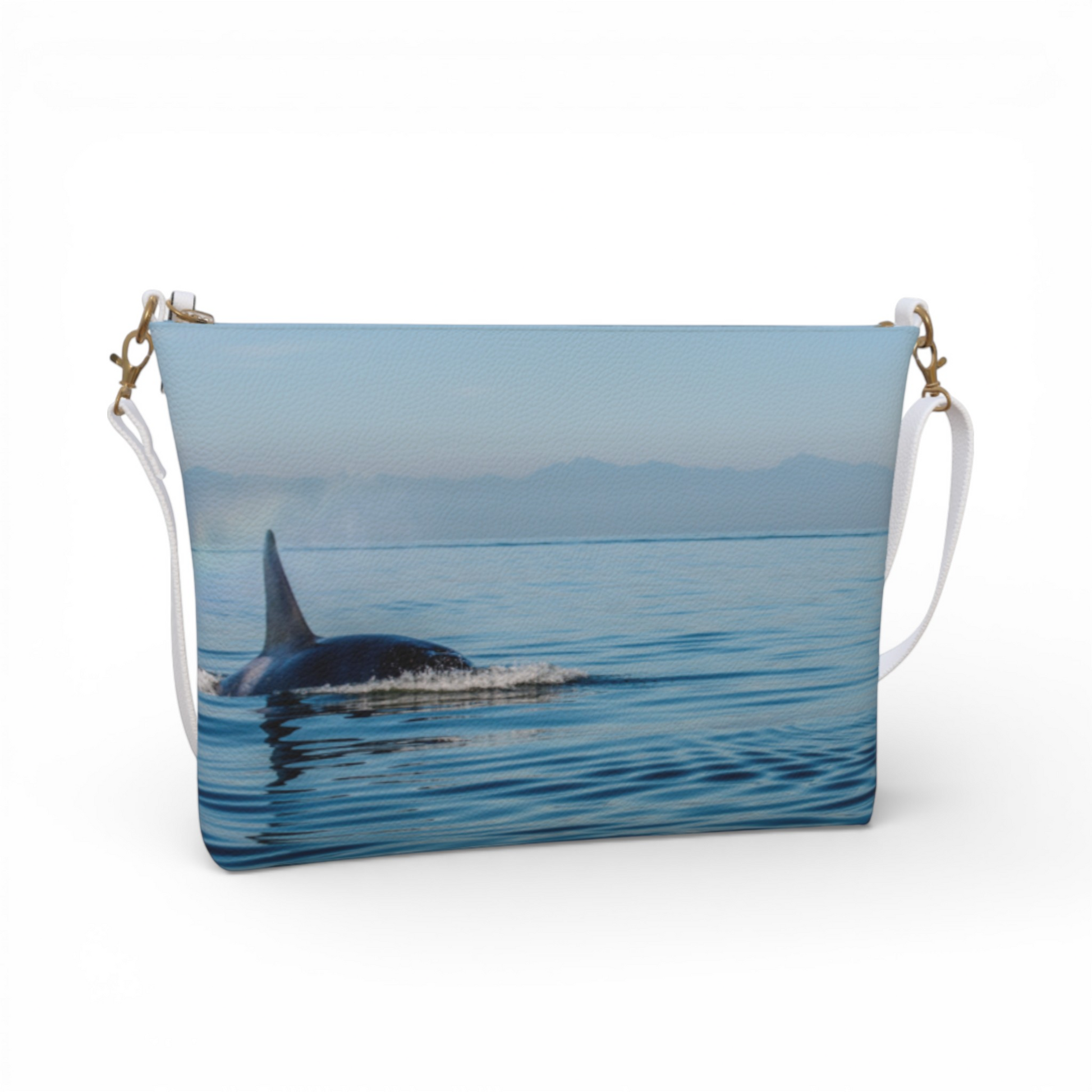 Van Isle Goddess Orca Spray vegan leather crossbody purse with adjustable white strap and orca whale graphic.