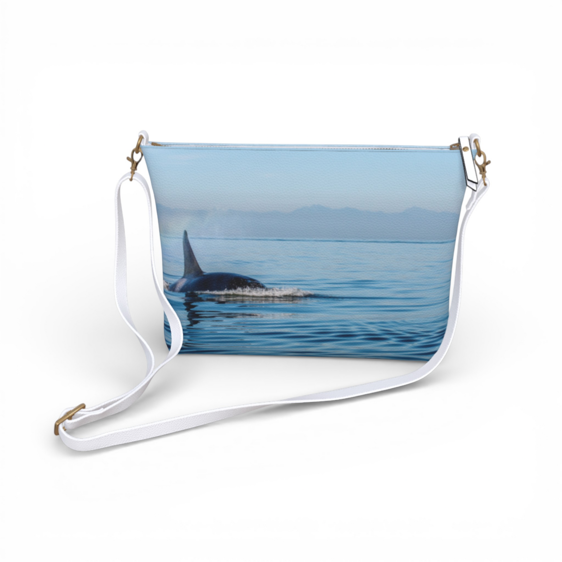 Van Isle Goddess Orca Spray vegan leather crossbody purse with adjustable white strap, featuring an orca whale swimming in blue water.
